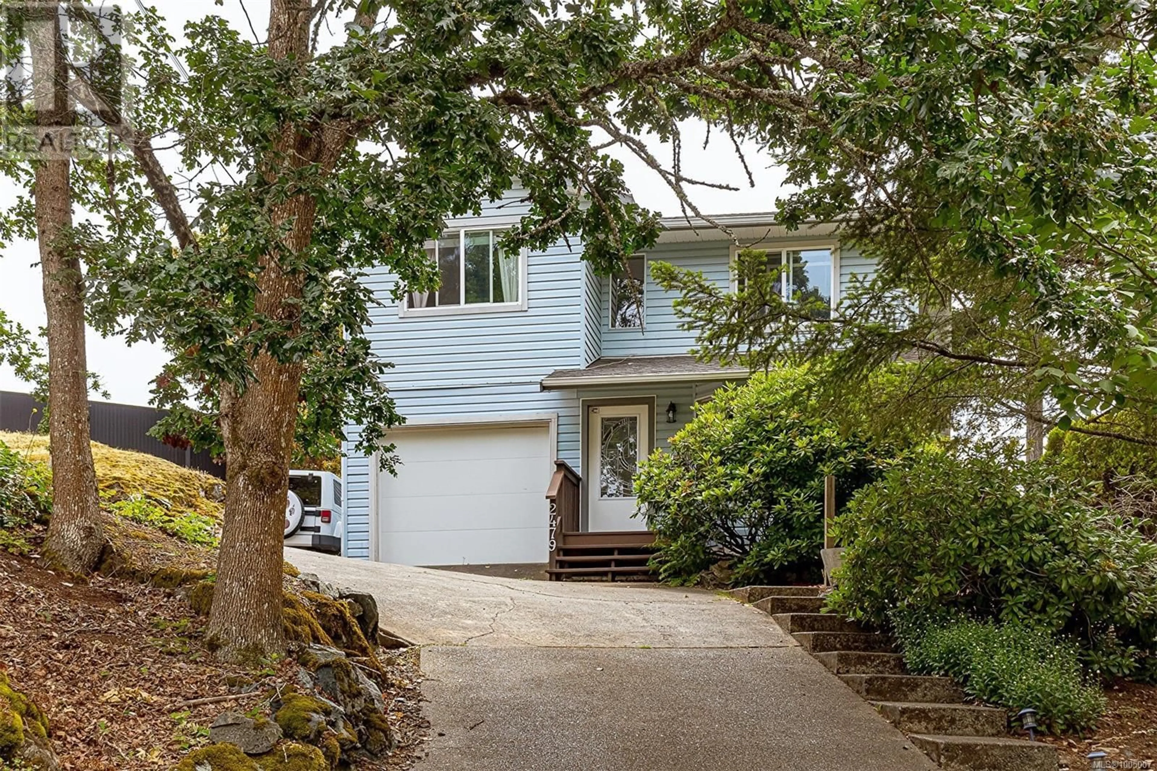 Home with vinyl exterior material, street for 2479 SKEDANS ROAD, Langford British Columbia V9B5H6