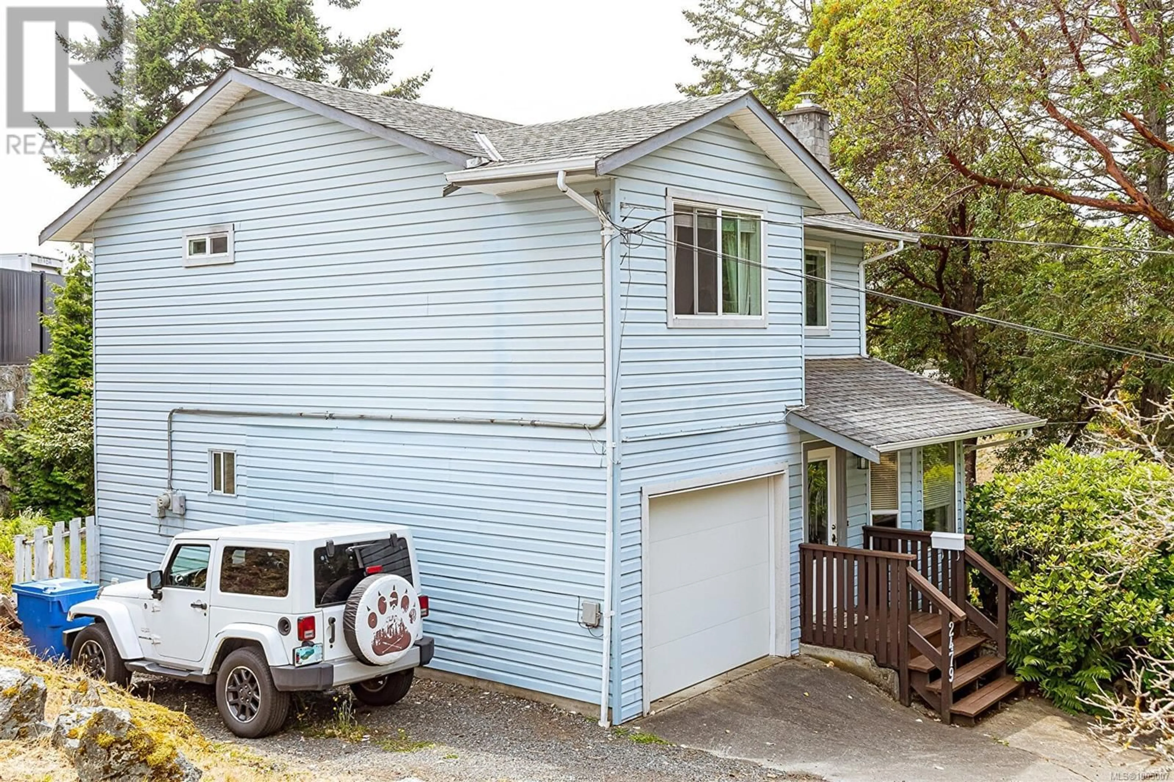 A pic from outside/outdoor area/front of a property/back of a property/a pic from drone, street for 2479 SKEDANS ROAD, Langford British Columbia V9B5H6