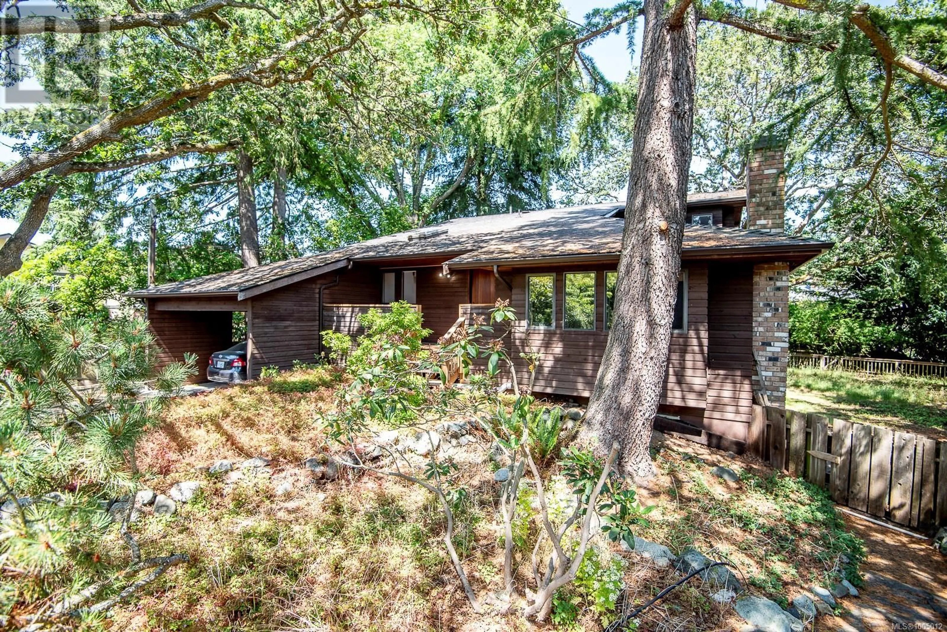 Home with brick exterior material, forest/trees view for 937 PEMBERTON ROAD, Victoria British Columbia V8S3R5