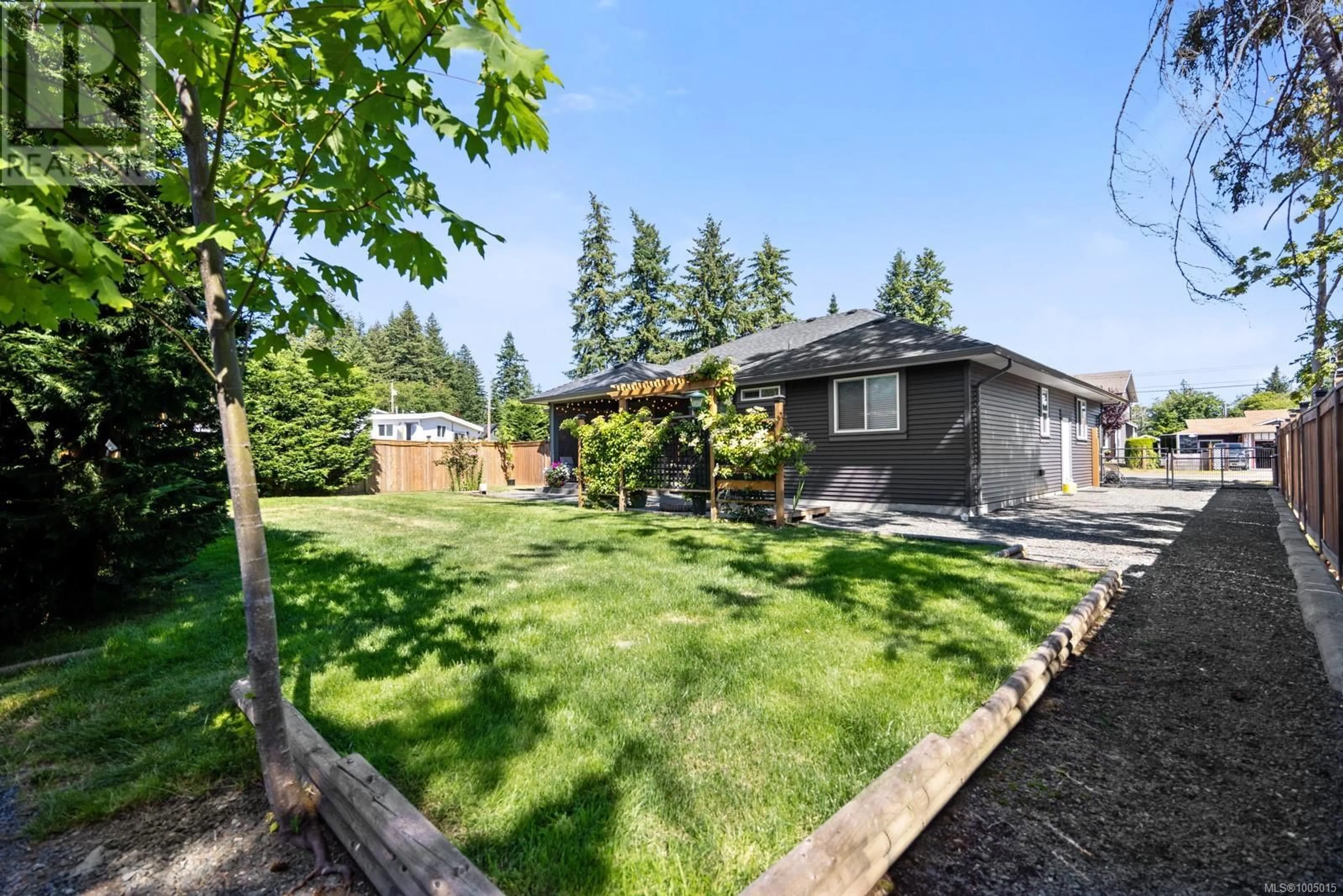 A pic from outside/outdoor area/front of a property/back of a property/a pic from drone, street for 157 SKIPTON CRESCENT, Campbell River British Columbia V9H1H3