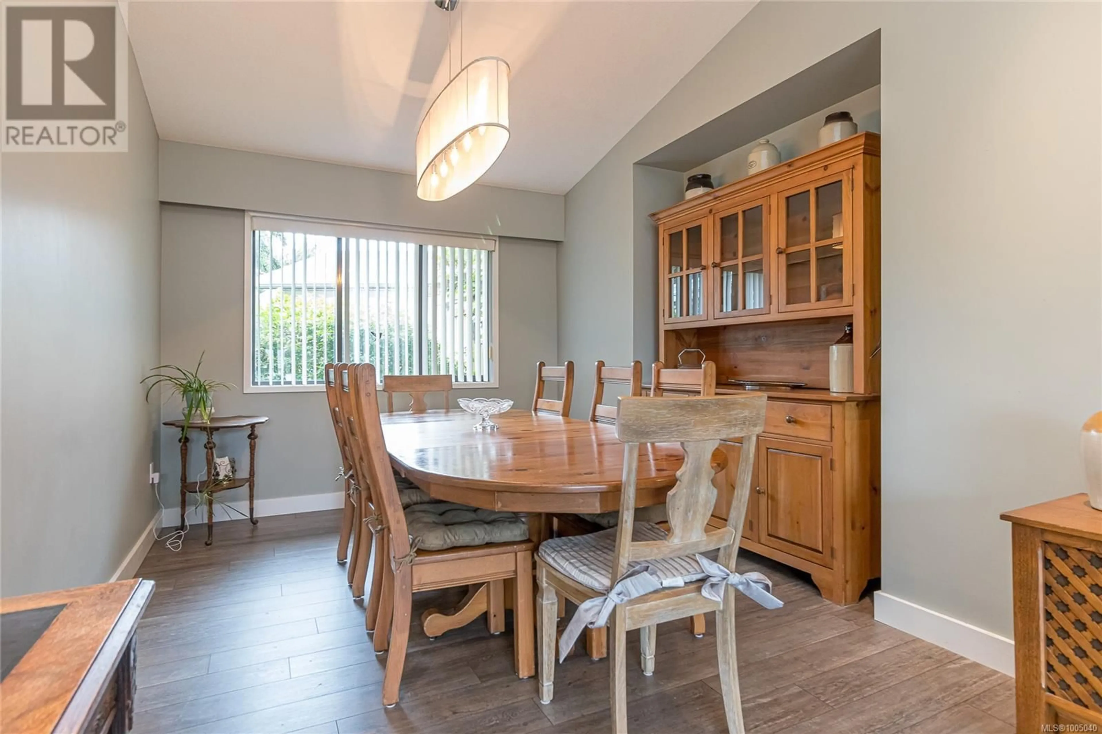 Dining room, wood/laminate floor for 1376 GREENWOOD WAY, French Creek British Columbia V9P1X1