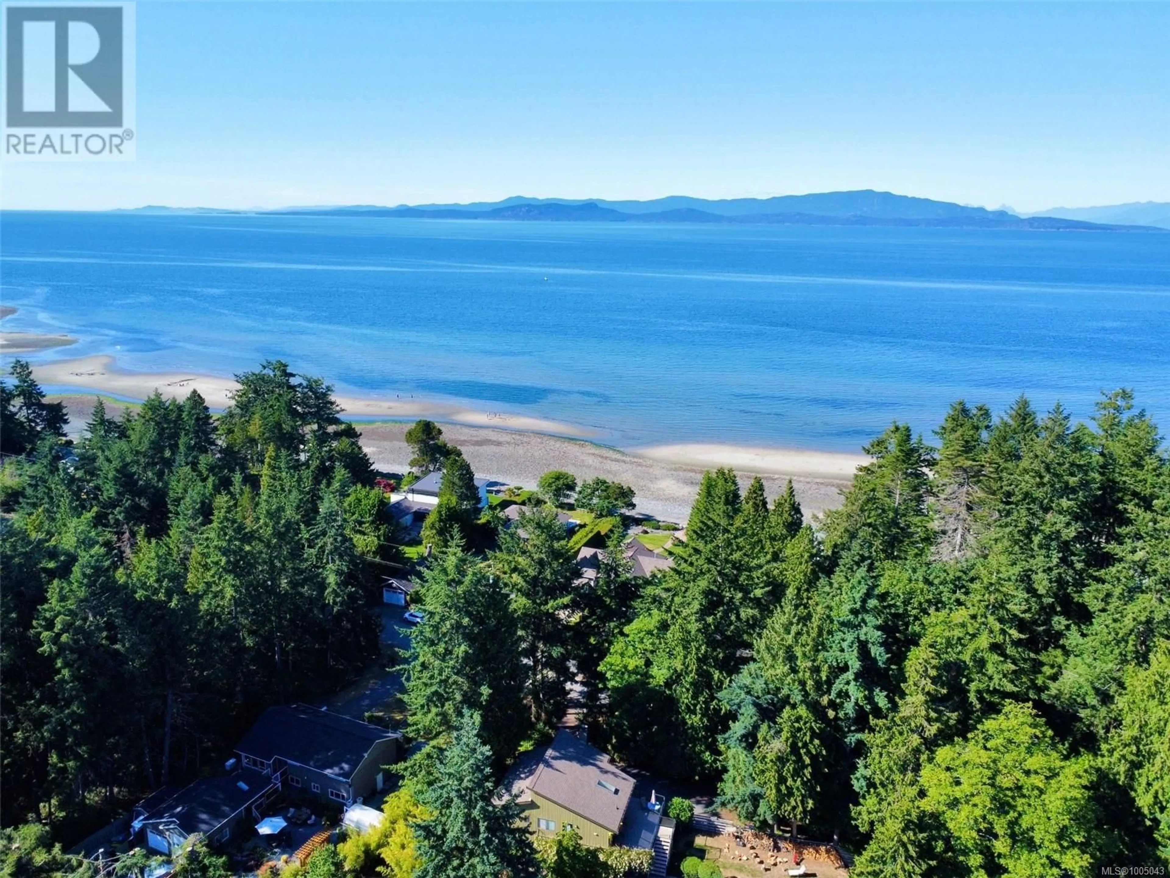 A pic from outside/outdoor area/front of a property/back of a property/a pic from drone, water/lake/river/ocean view for 955 BALLENAS ROAD, Parksville British Columbia V9P1T4