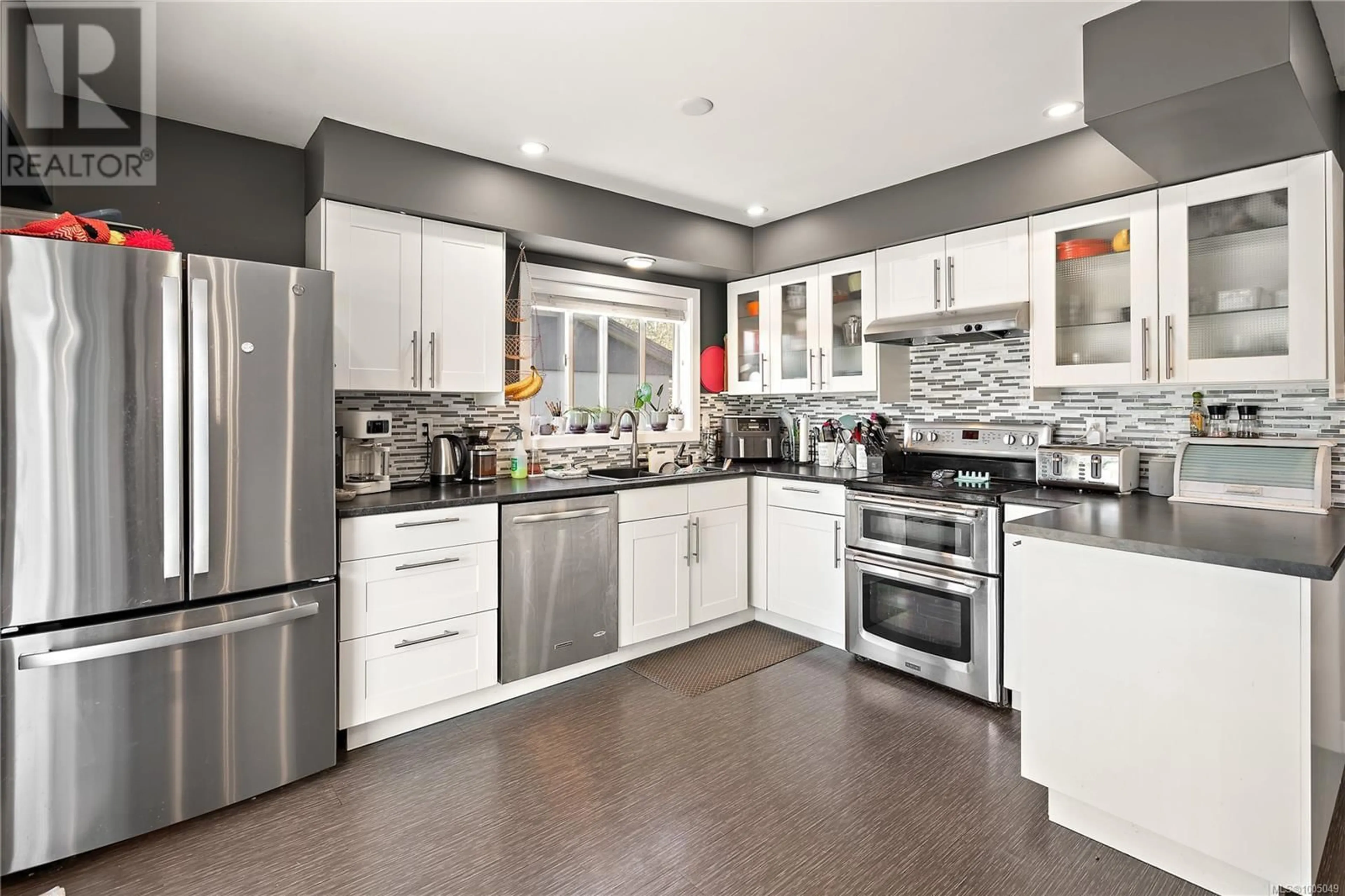 Contemporary kitchen, ceramic/tile floor for 2015 LINDA PLACE, Sidney British Columbia V8L2N4