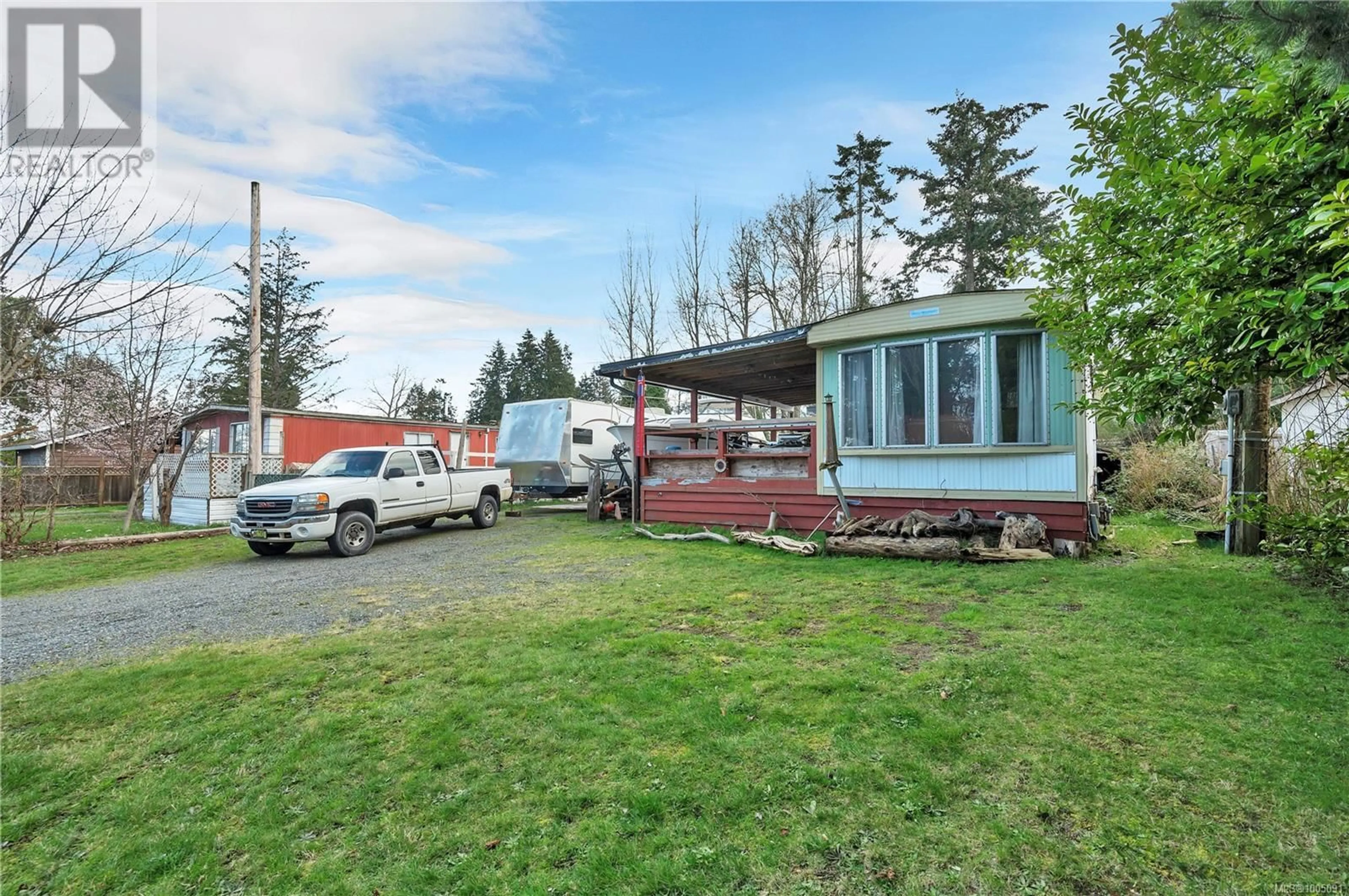 A pic from outside/outdoor area/front of a property/back of a property/a pic from drone, street for 79 LYNNWOOD ROAD, Campbell River British Columbia V9H1G9