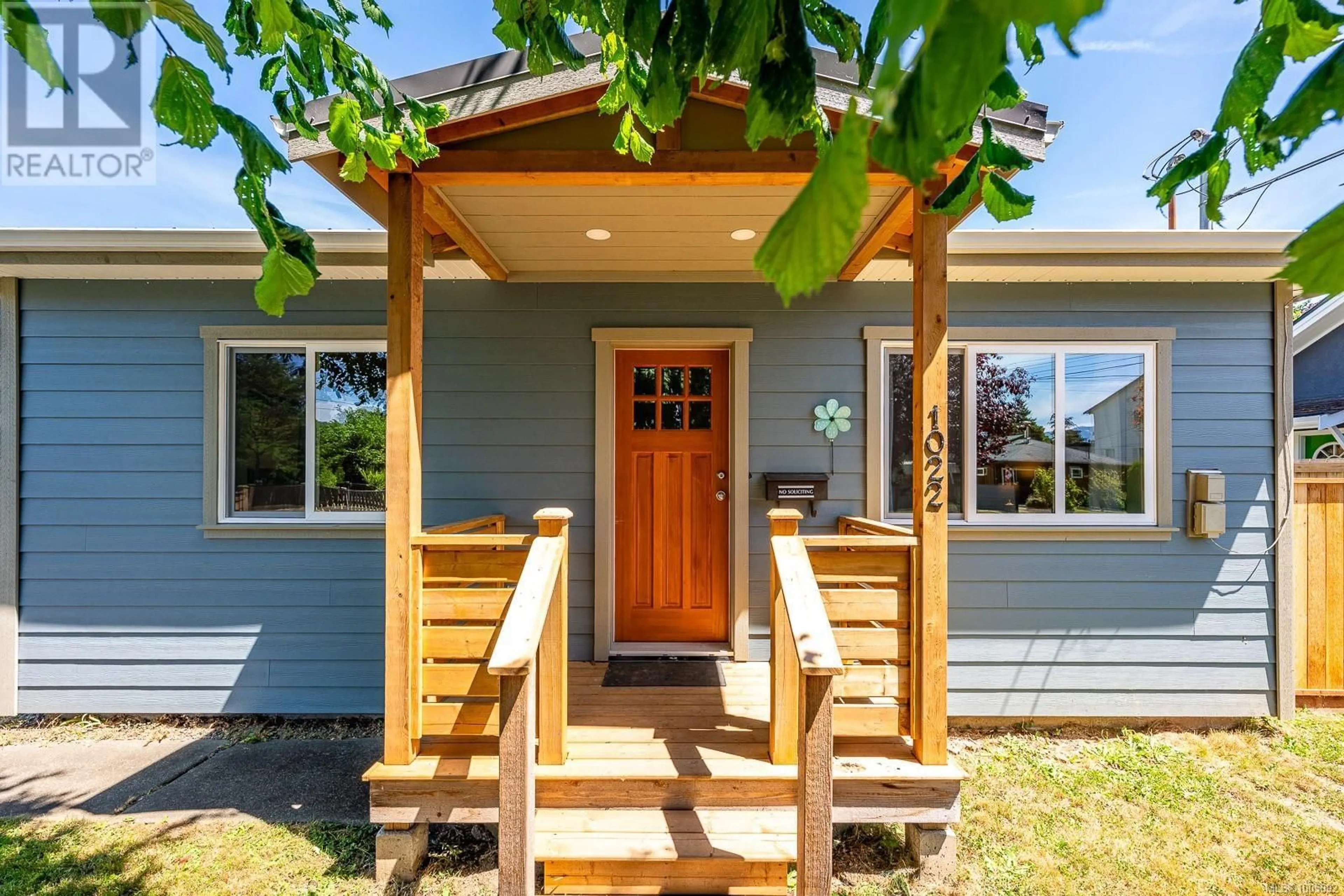 Home with vinyl exterior material, street for 1022 URQUHART AVENUE, Courtenay British Columbia V9N3K5