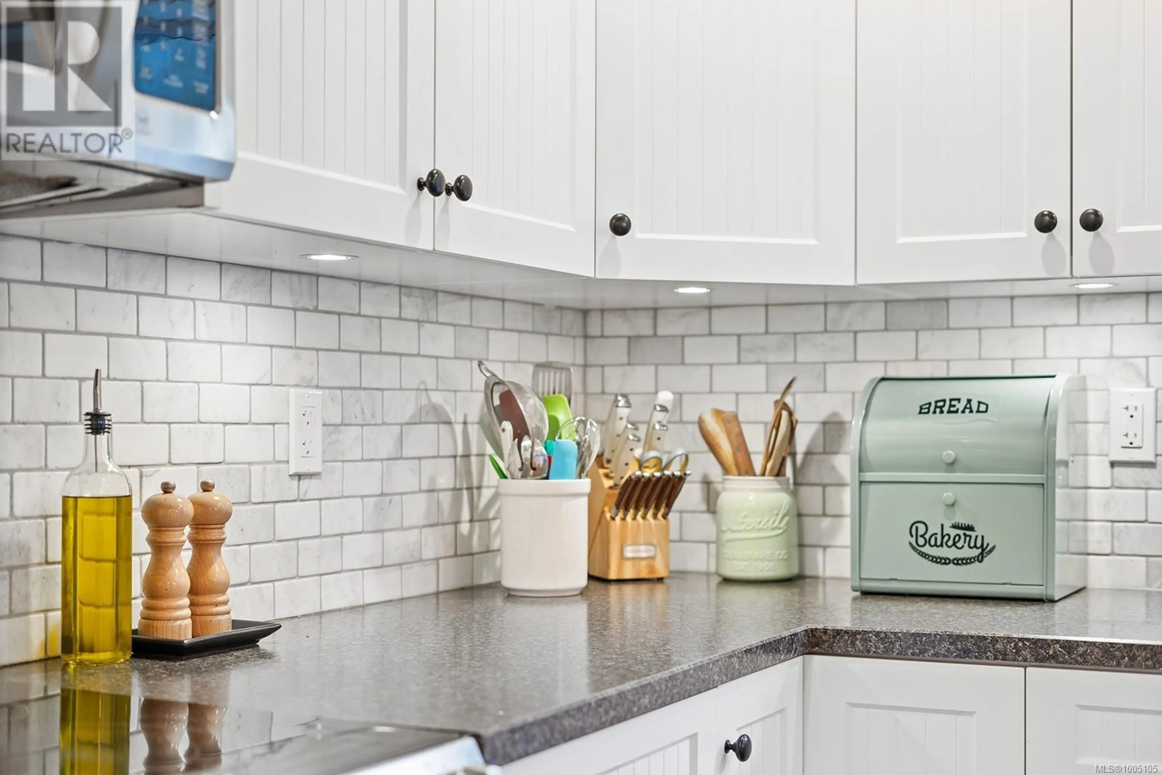 Contemporary kitchen, ceramic/tile floor for 1065 SPIDER LAKE ROAD, Qualicum Beach British Columbia V9K2L7