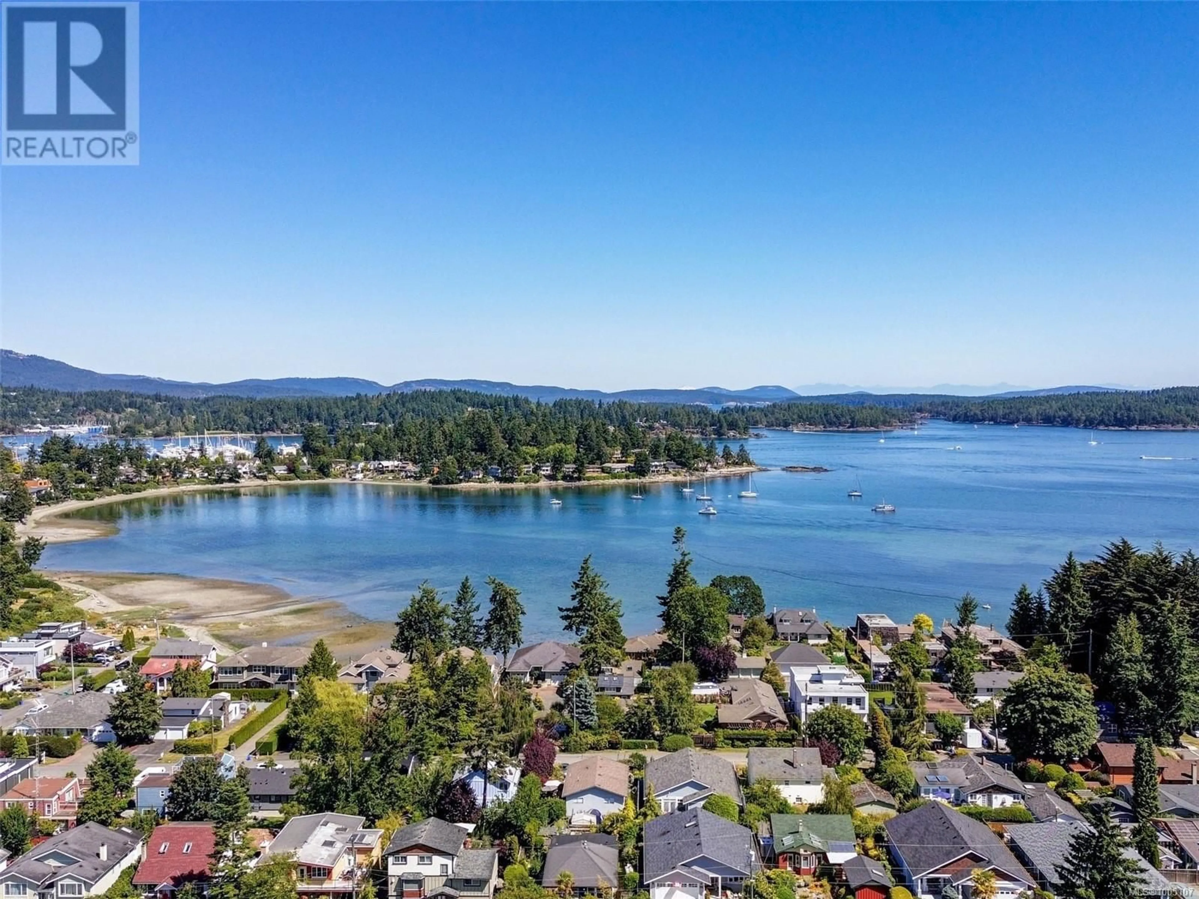 A pic from outside/outdoor area/front of a property/back of a property/a pic from drone, water/lake/river/ocean view for 203 - 2427 AMHERST AVENUE, Sidney British Columbia V8L2H1