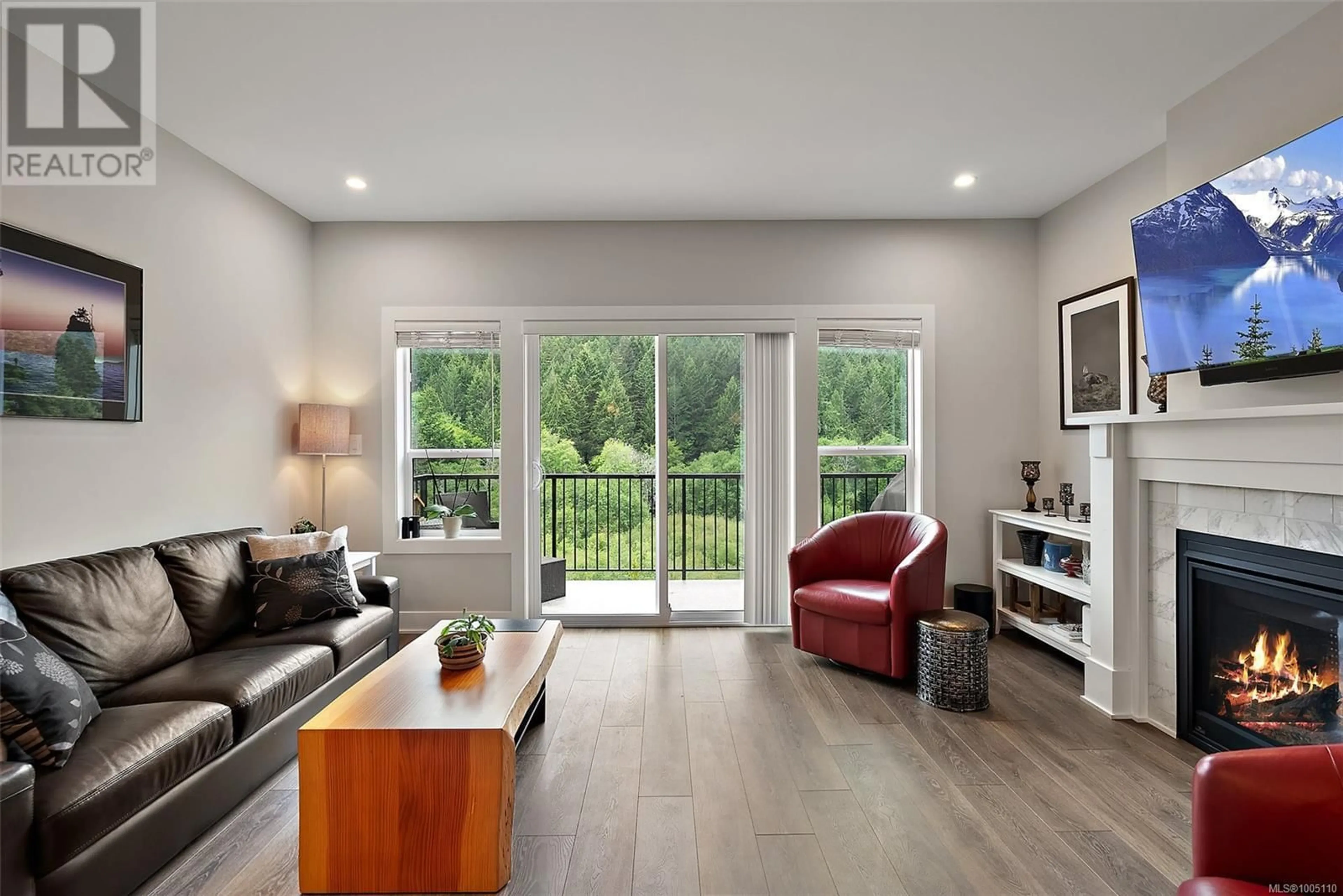 Living room with furniture, wood/laminate floor for 1281 CENTAURI DRIVE, Langford British Columbia V9B3R6