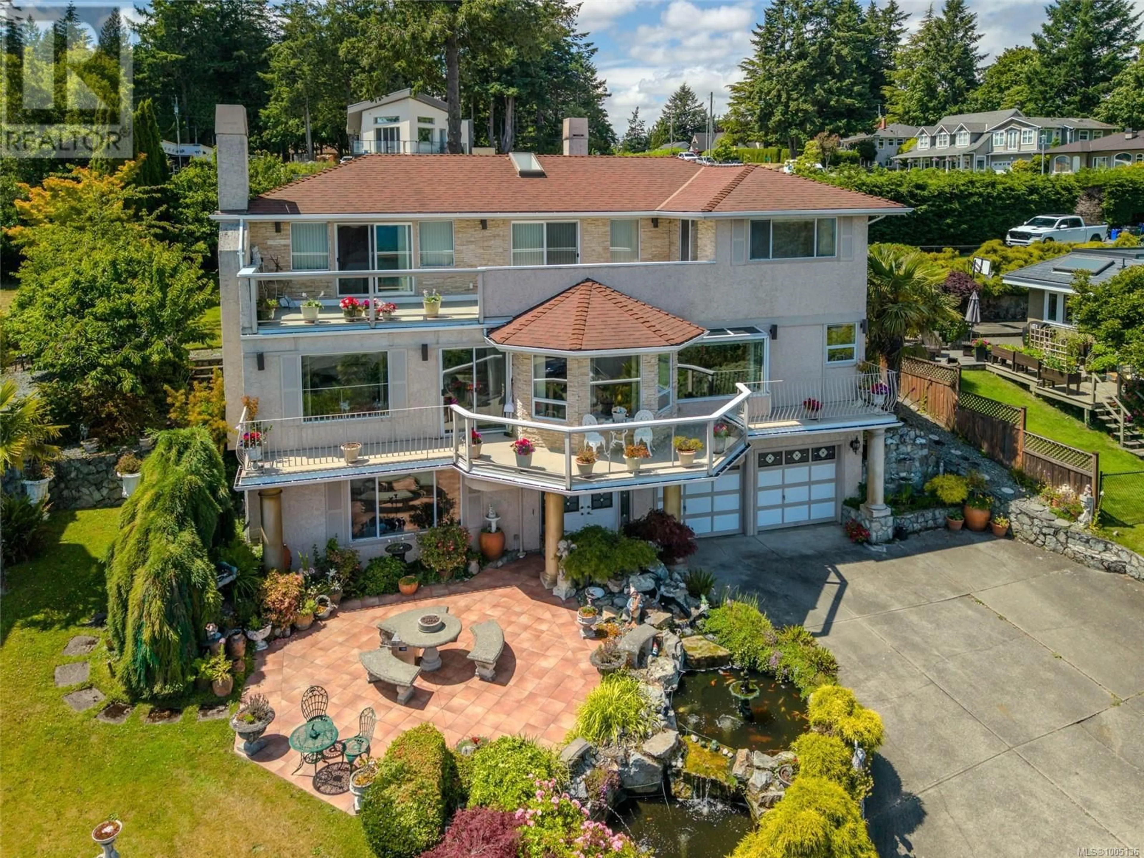A pic from outside/outdoor area/front of a property/back of a property/a pic from drone, street for 5200 POLSON TERRACE, Saanich British Columbia V8Y2C6