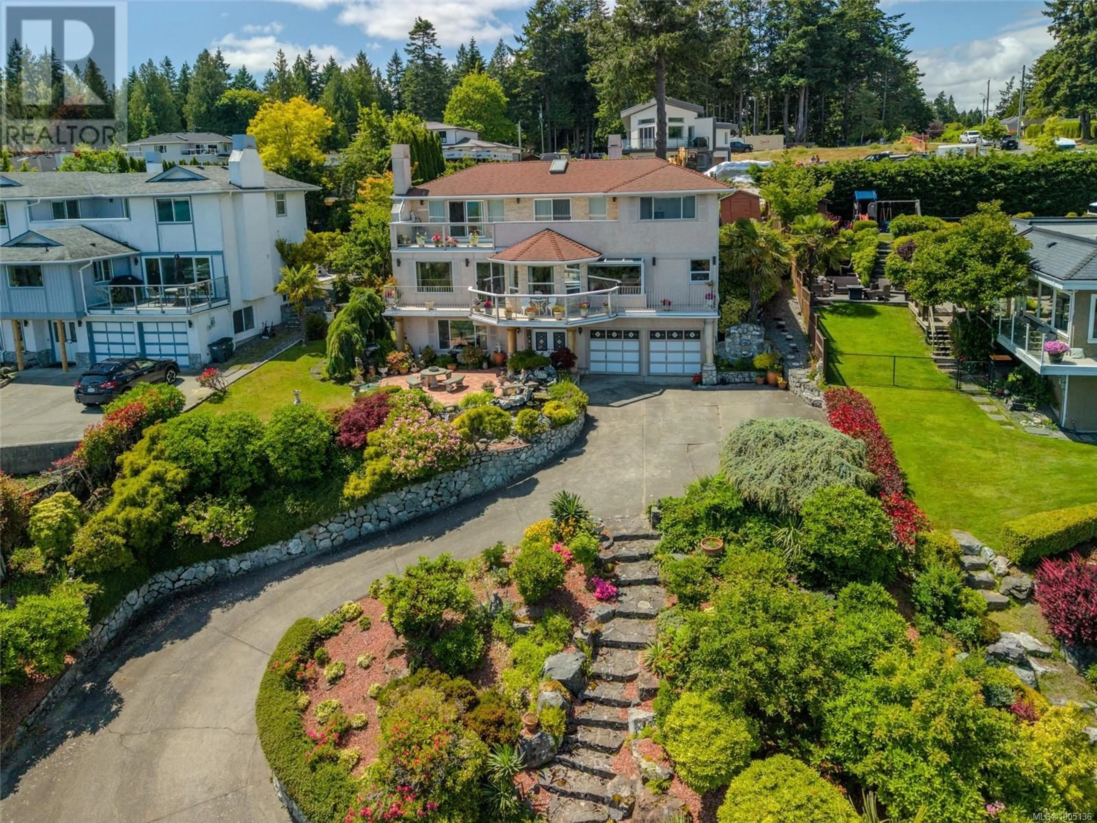 A pic from outside/outdoor area/front of a property/back of a property/a pic from drone, unknown for 5200 POLSON TERRACE, Saanich British Columbia V8Y2C6