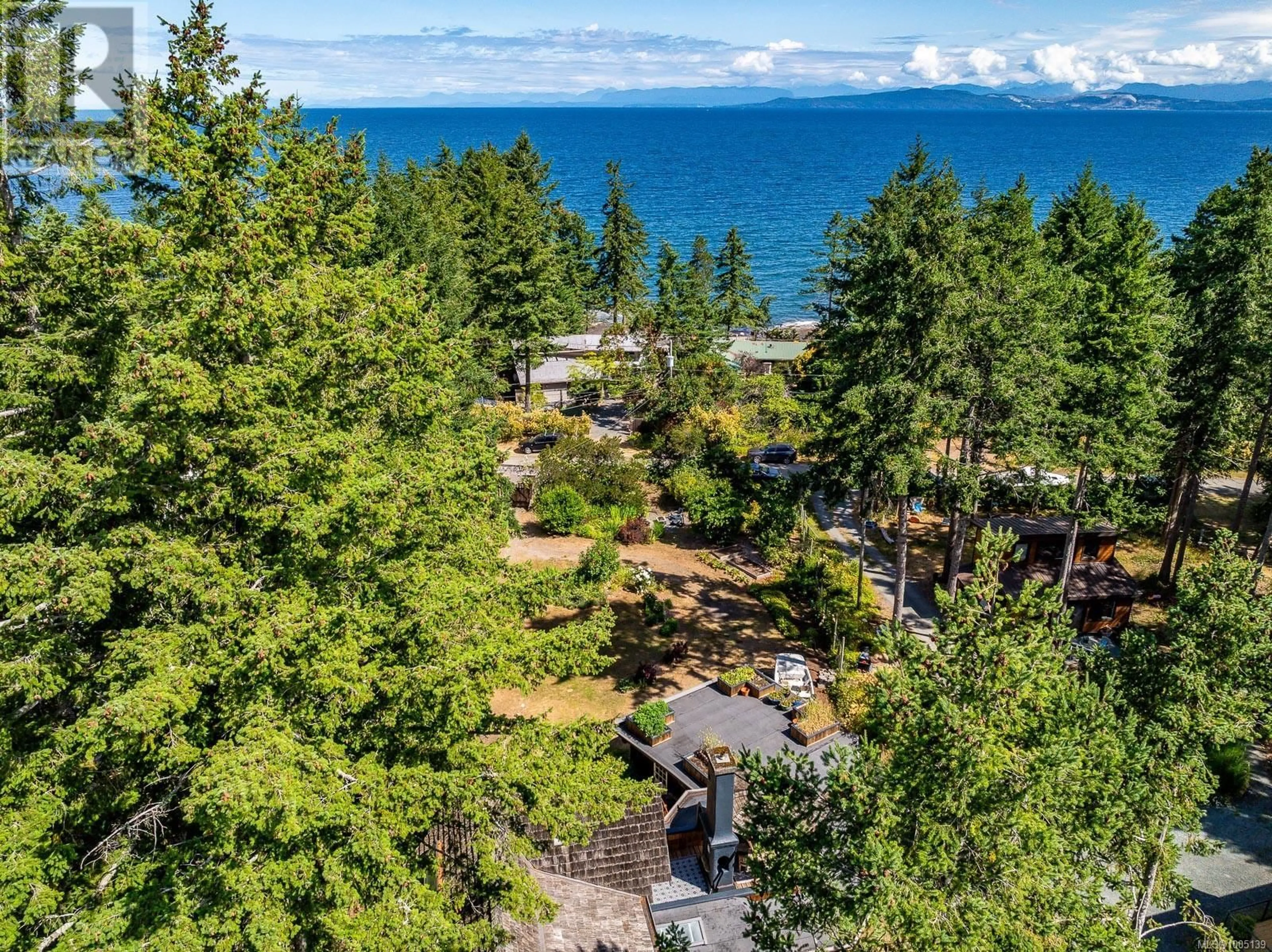 A pic from outside/outdoor area/front of a property/back of a property/a pic from drone, water/lake/river/ocean view for 3160 HARWOOD ROAD, Hornby Island British Columbia V0R1Z0