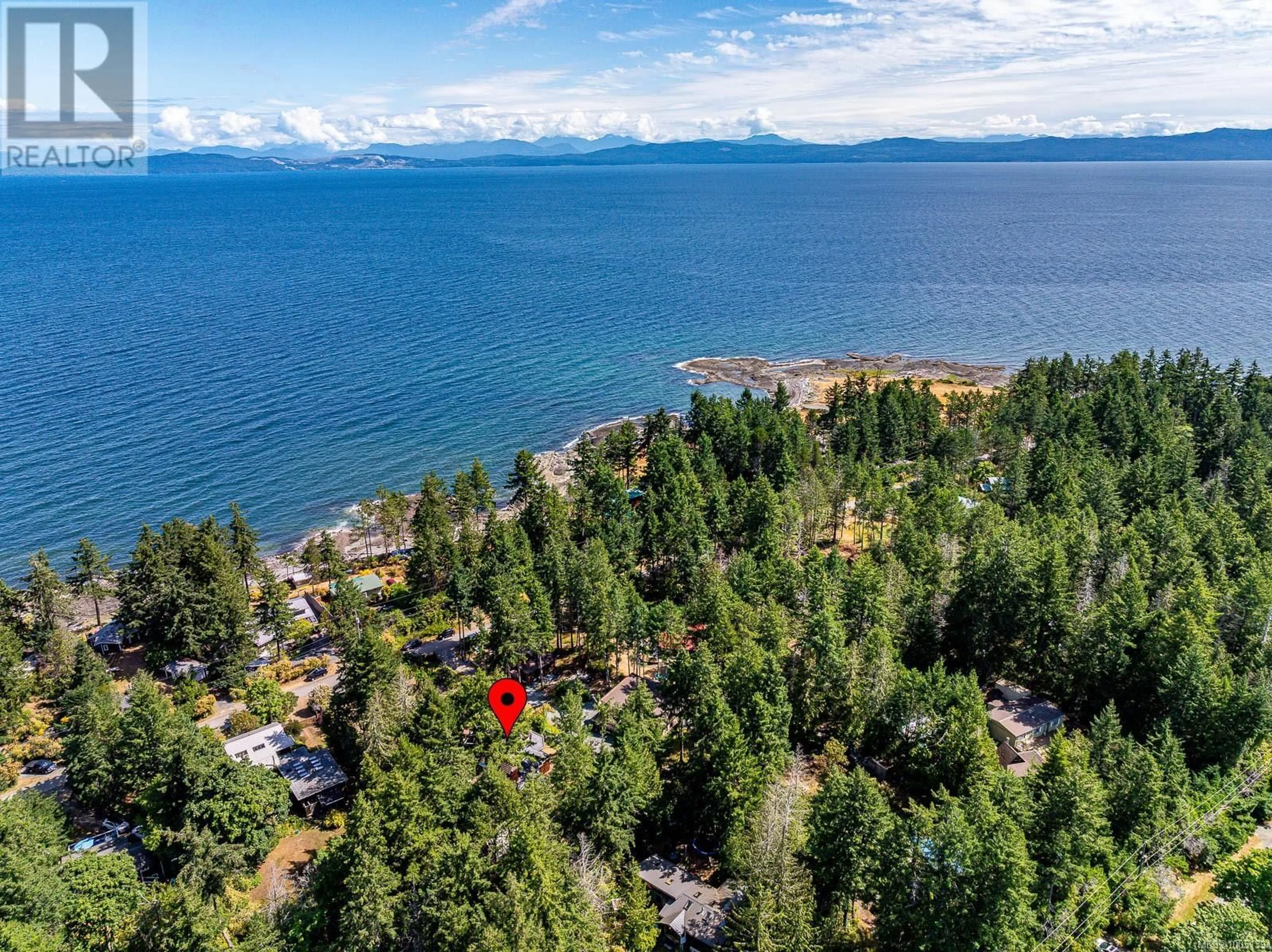 A pic from outside/outdoor area/front of a property/back of a property/a pic from drone, water/lake/river/ocean view for 3160 HARWOOD ROAD, Hornby Island British Columbia V0R1Z0