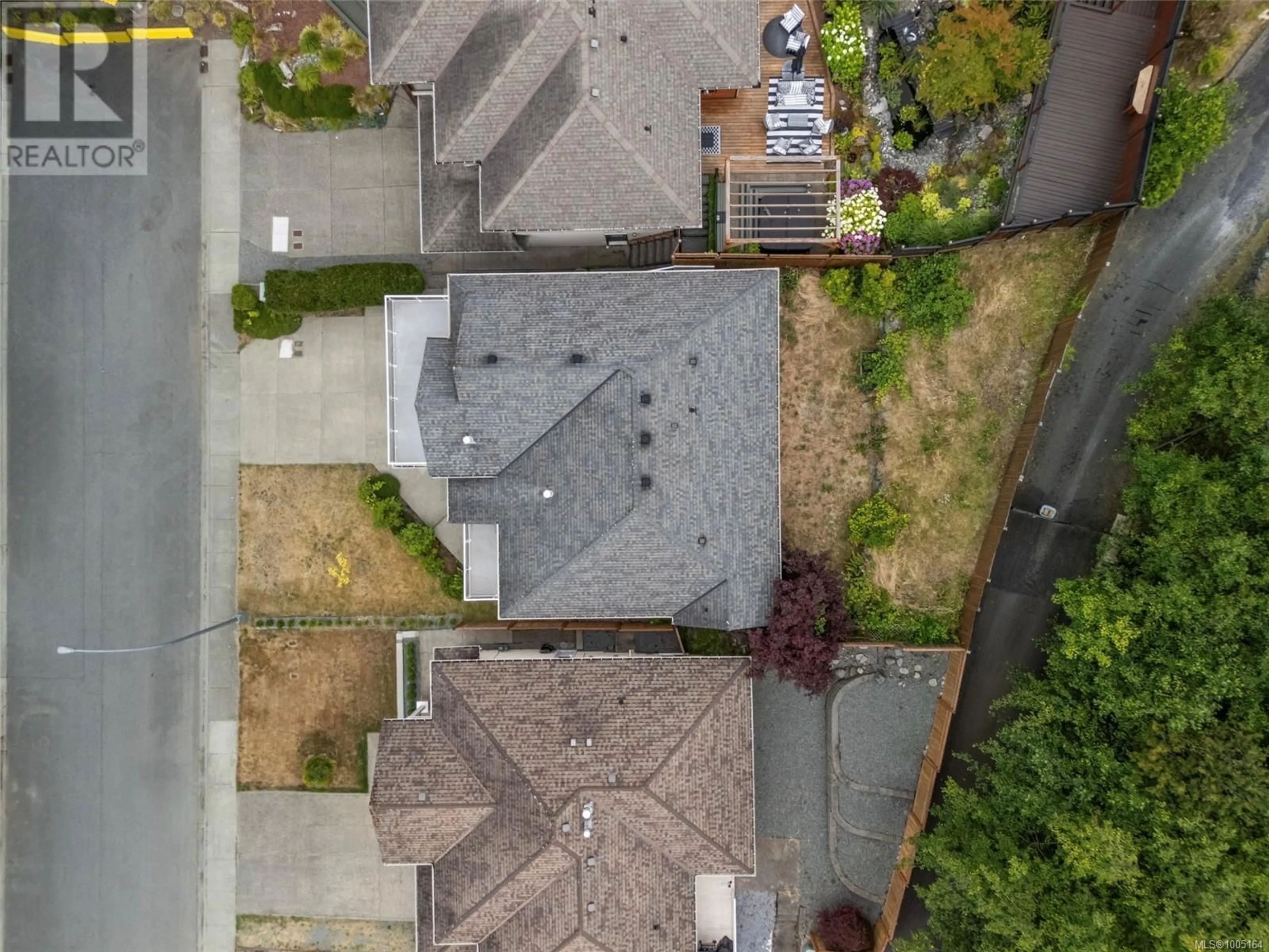 A pic from outside/outdoor area/front of a property/back of a property/a pic from drone, street for 5529 NORTON ROAD, Nanaimo British Columbia V9T6S2