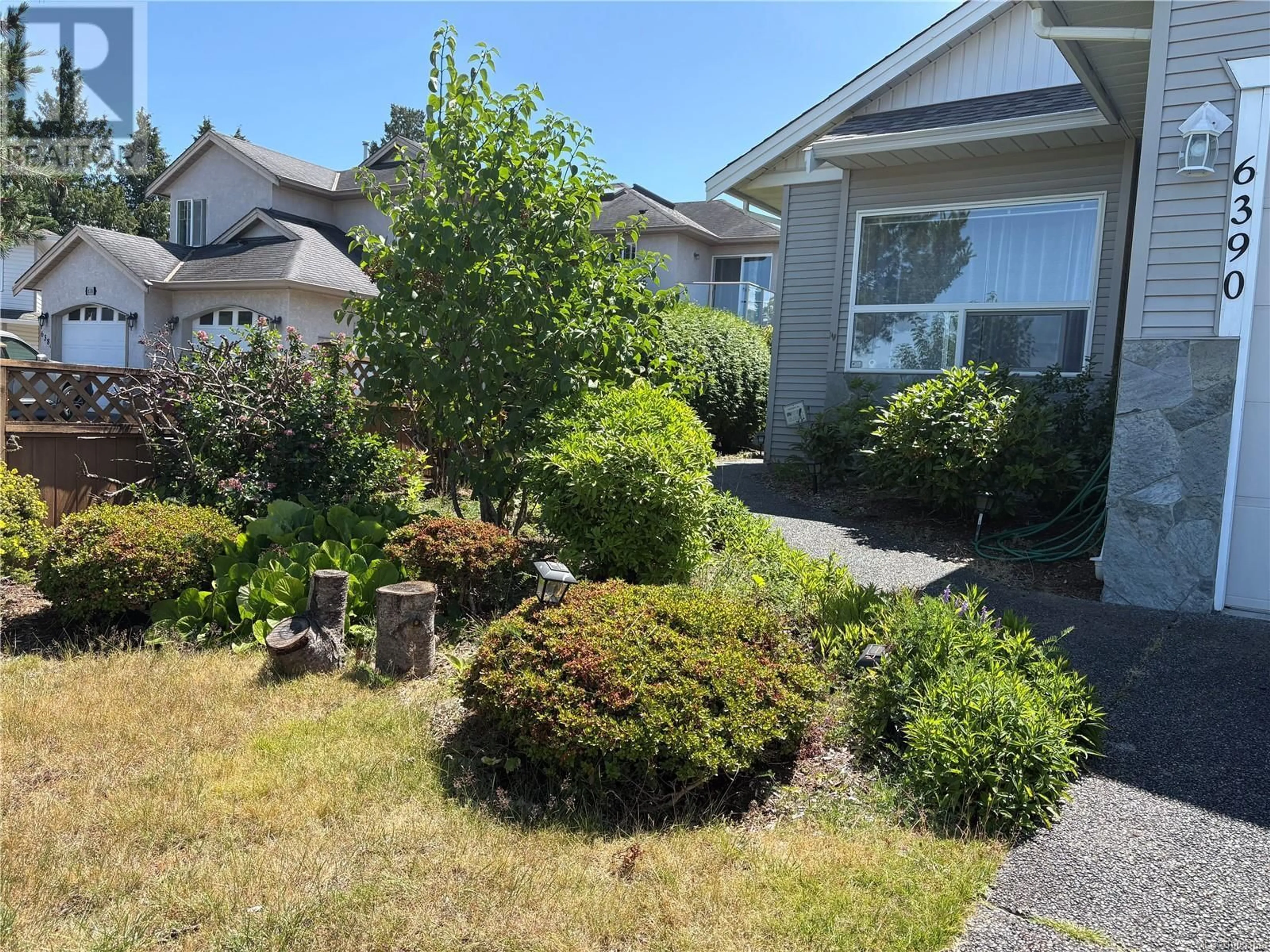 A pic from outside/outdoor area/front of a property/back of a property/a pic from drone, street for 6390 LASALLE ROAD, Nanaimo British Columbia V9V1N6