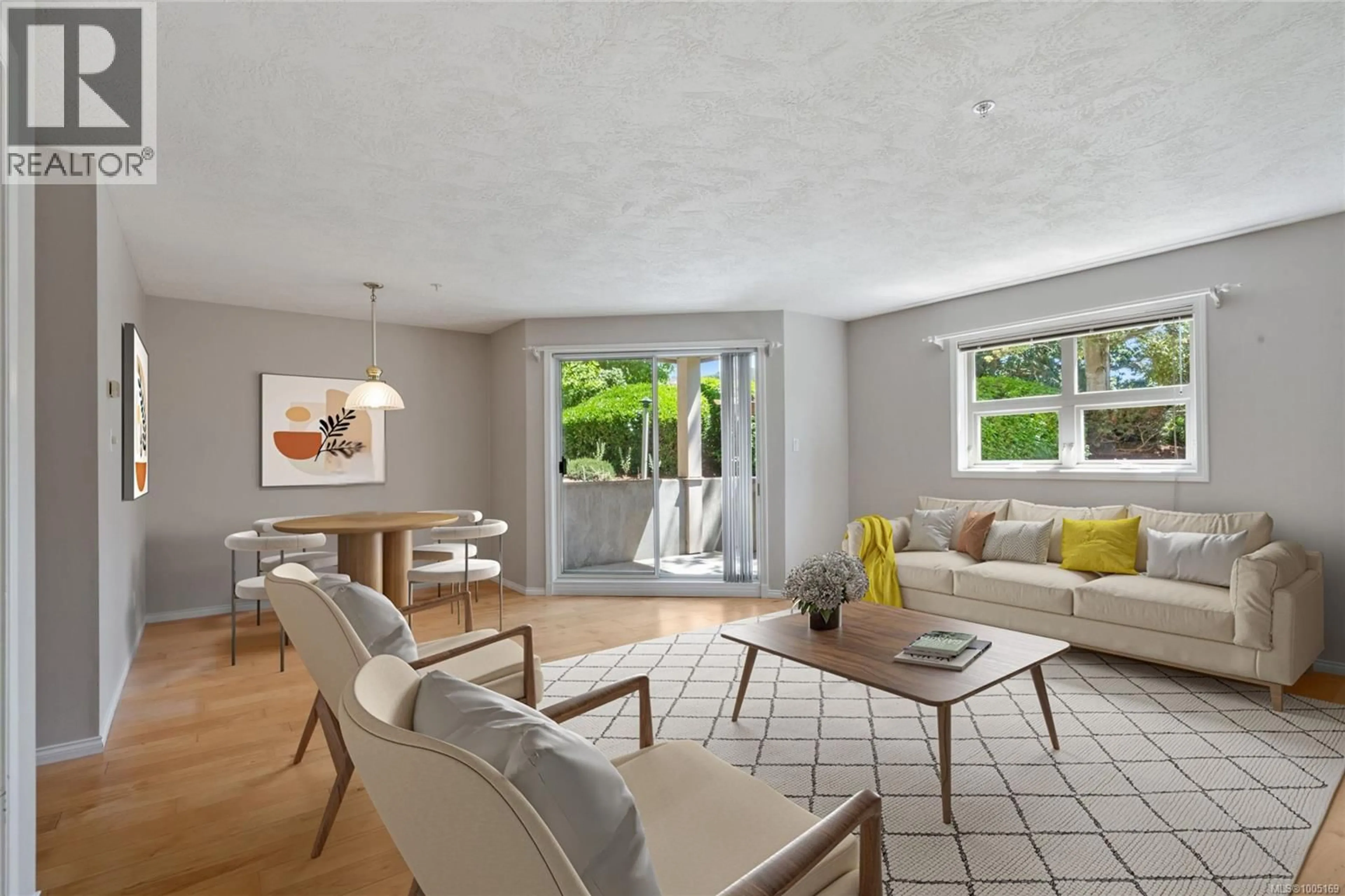 Living room with furniture, unknown for 102 - 1694 CEDAR HILL CROSS ROAD, Saanich British Columbia V8P2P7
