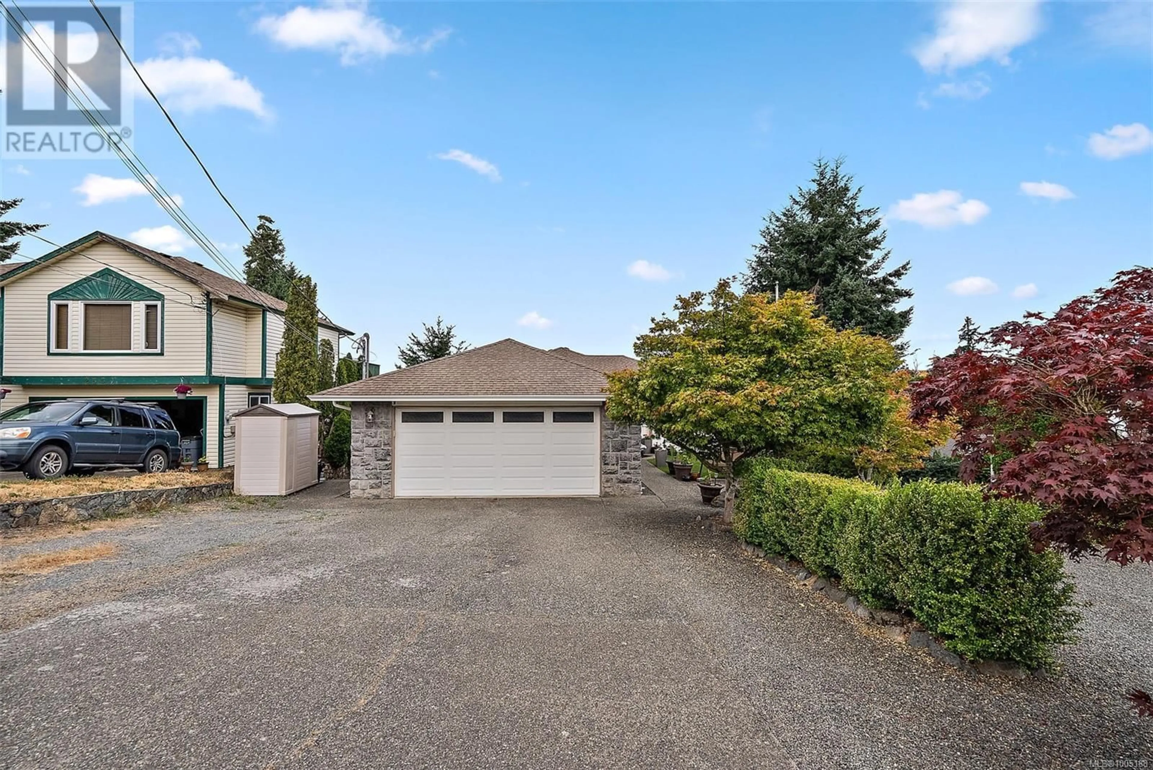 A pic from outside/outdoor area/front of a property/back of a property/a pic from drone, street for 2557 BUCKLER AVENUE, Langford British Columbia V9B5V3