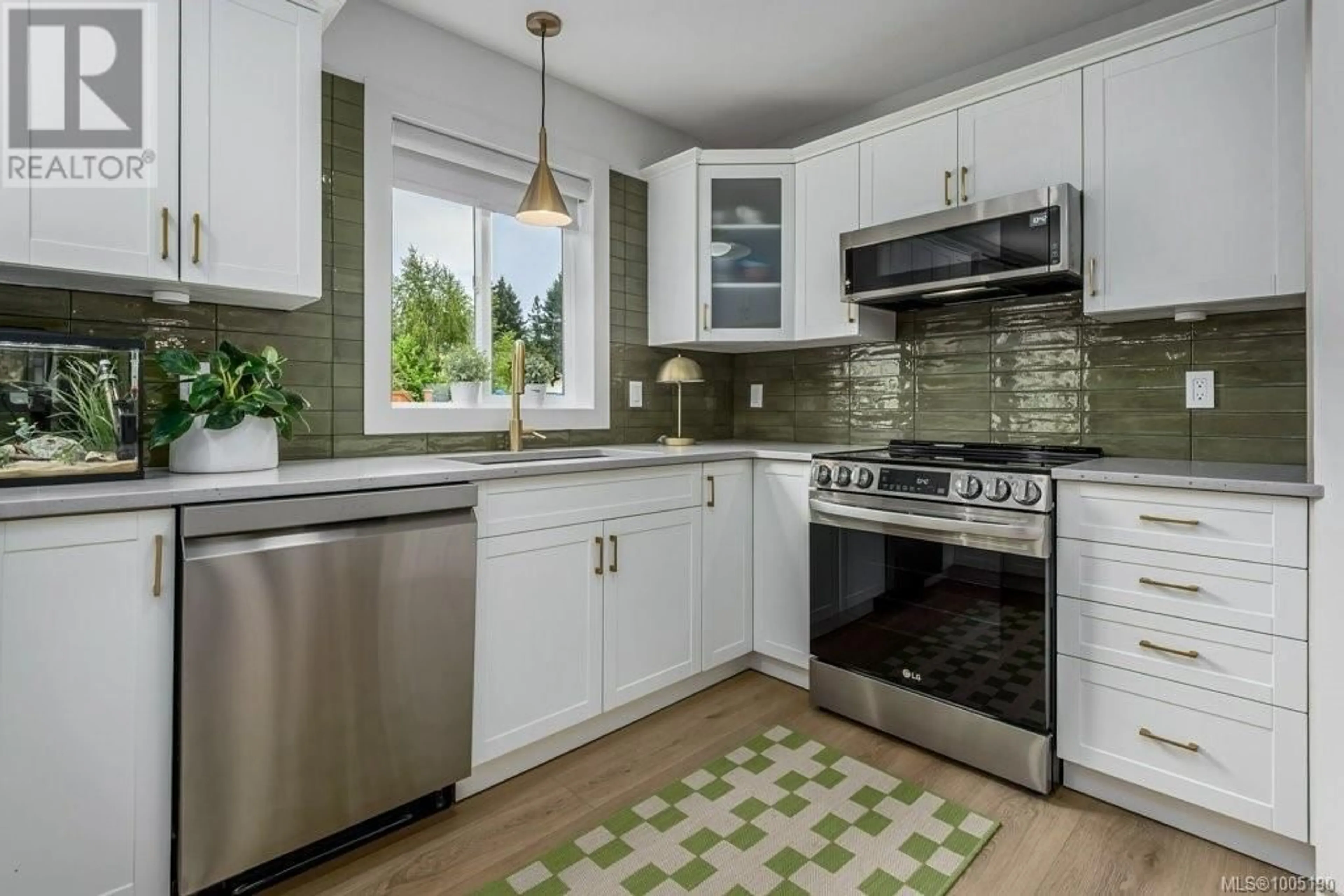 Open concept kitchen, ceramic/tile floor for 2966 ELDERBERRY CRESCENT, Courtenay British Columbia V9N9W8