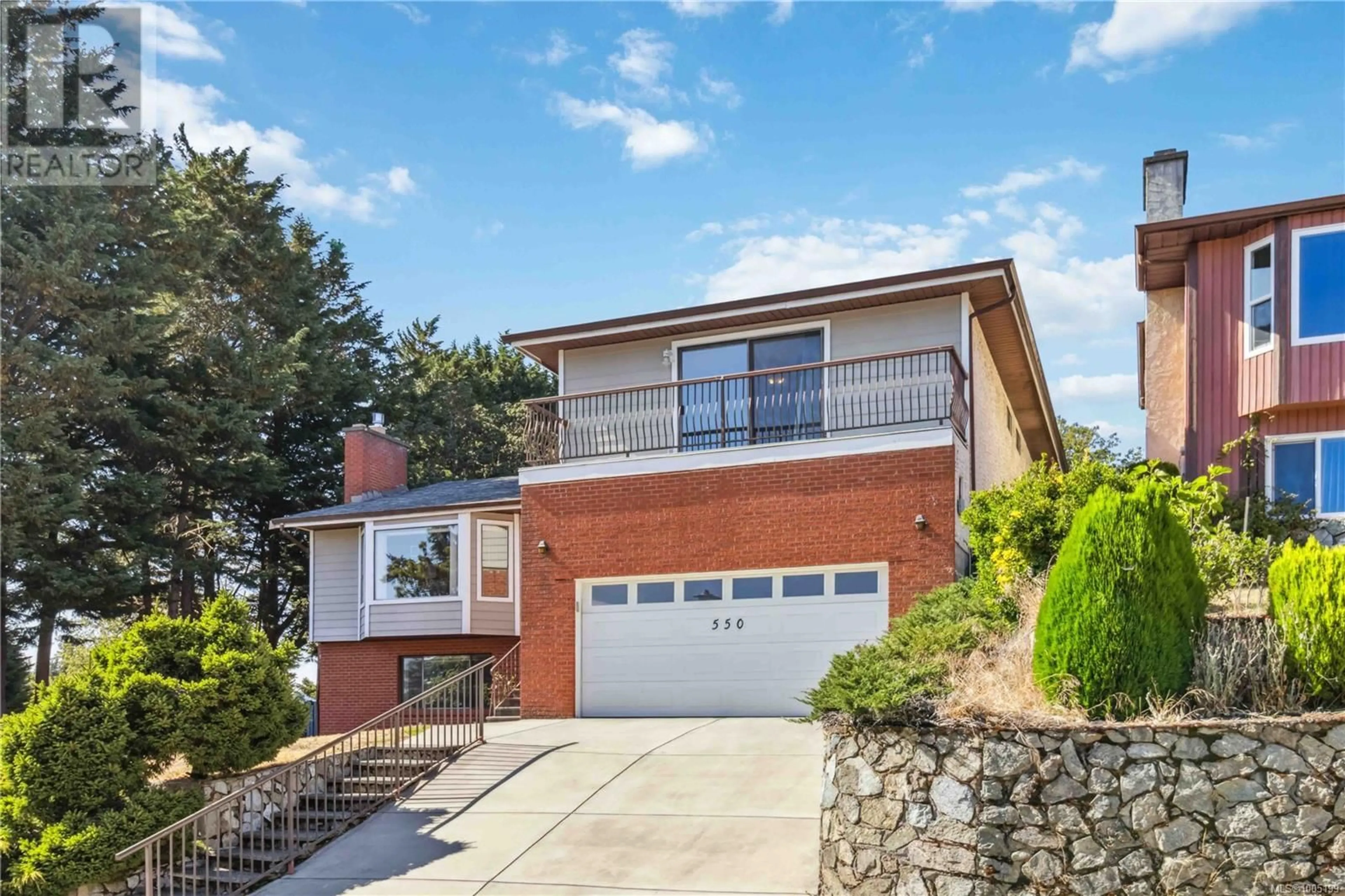 Home with brick exterior material, street for 550 FERMOY PLACE, Saanich British Columbia V8Z6N2