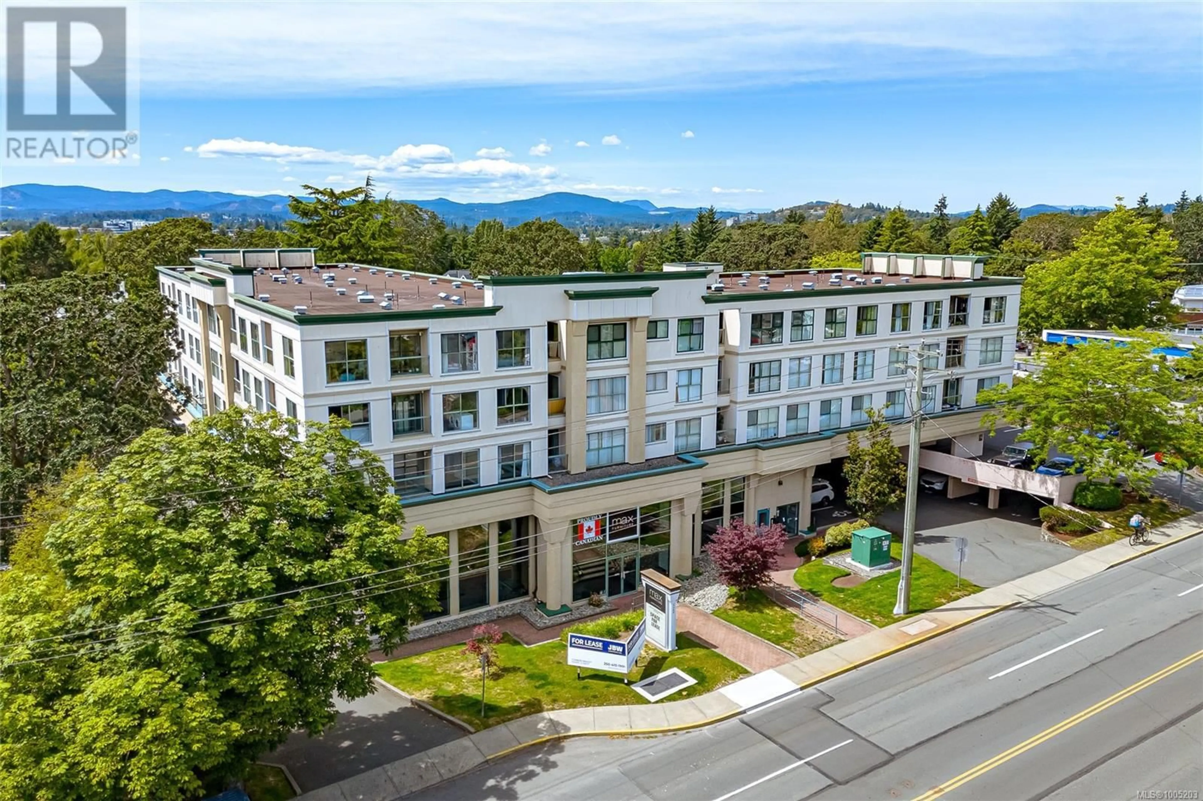 A pic from outside/outdoor area/front of a property/back of a property/a pic from drone, mountain view for 207 - 3460 QUADRA STREET, Saanich British Columbia V8X1G6