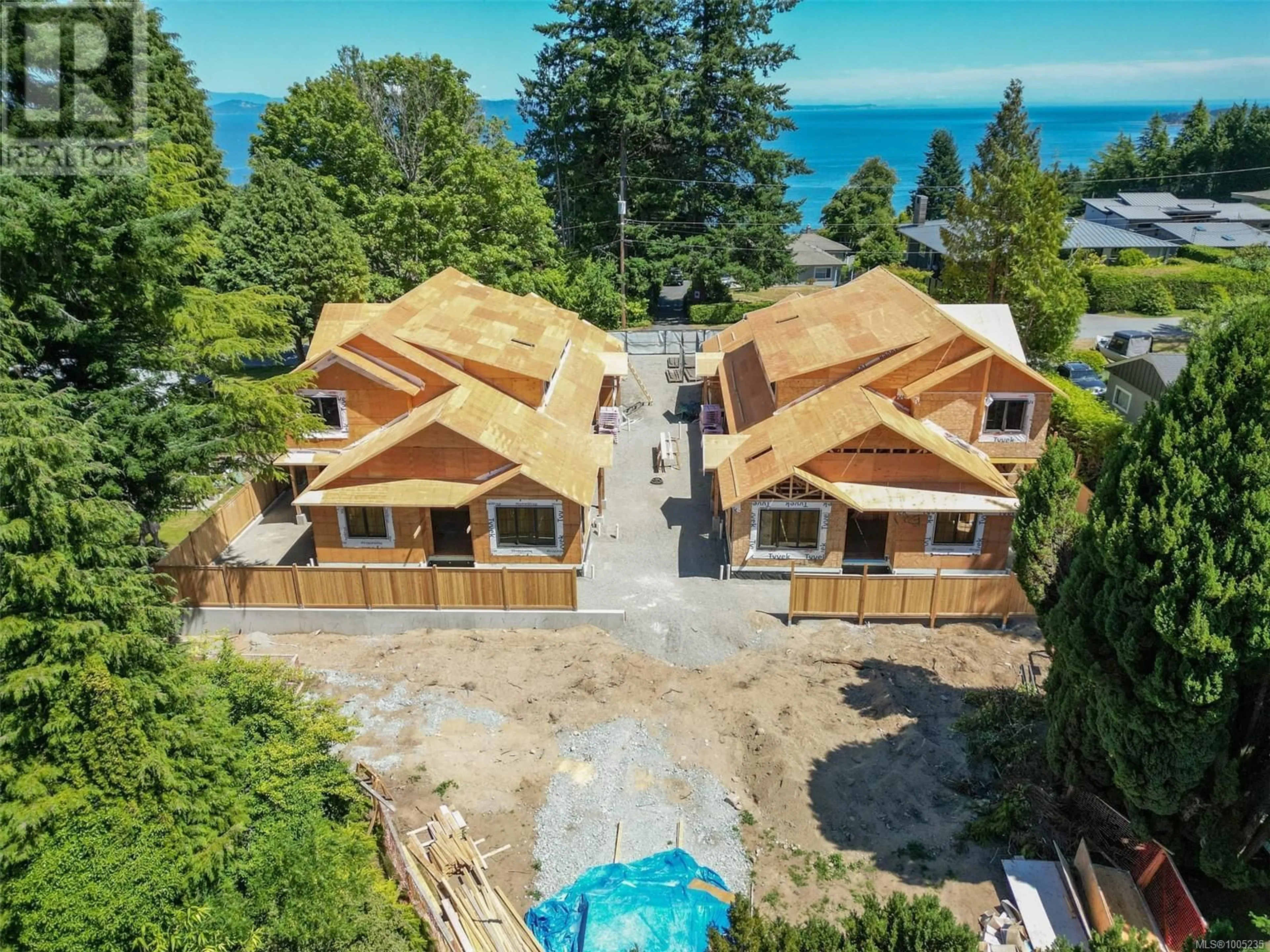 A pic from outside/outdoor area/front of a property/back of a property/a pic from drone, water/lake/river/ocean view for 2 - 5032 WESLEY ROAD, Saanich British Columbia V8Y1Z4