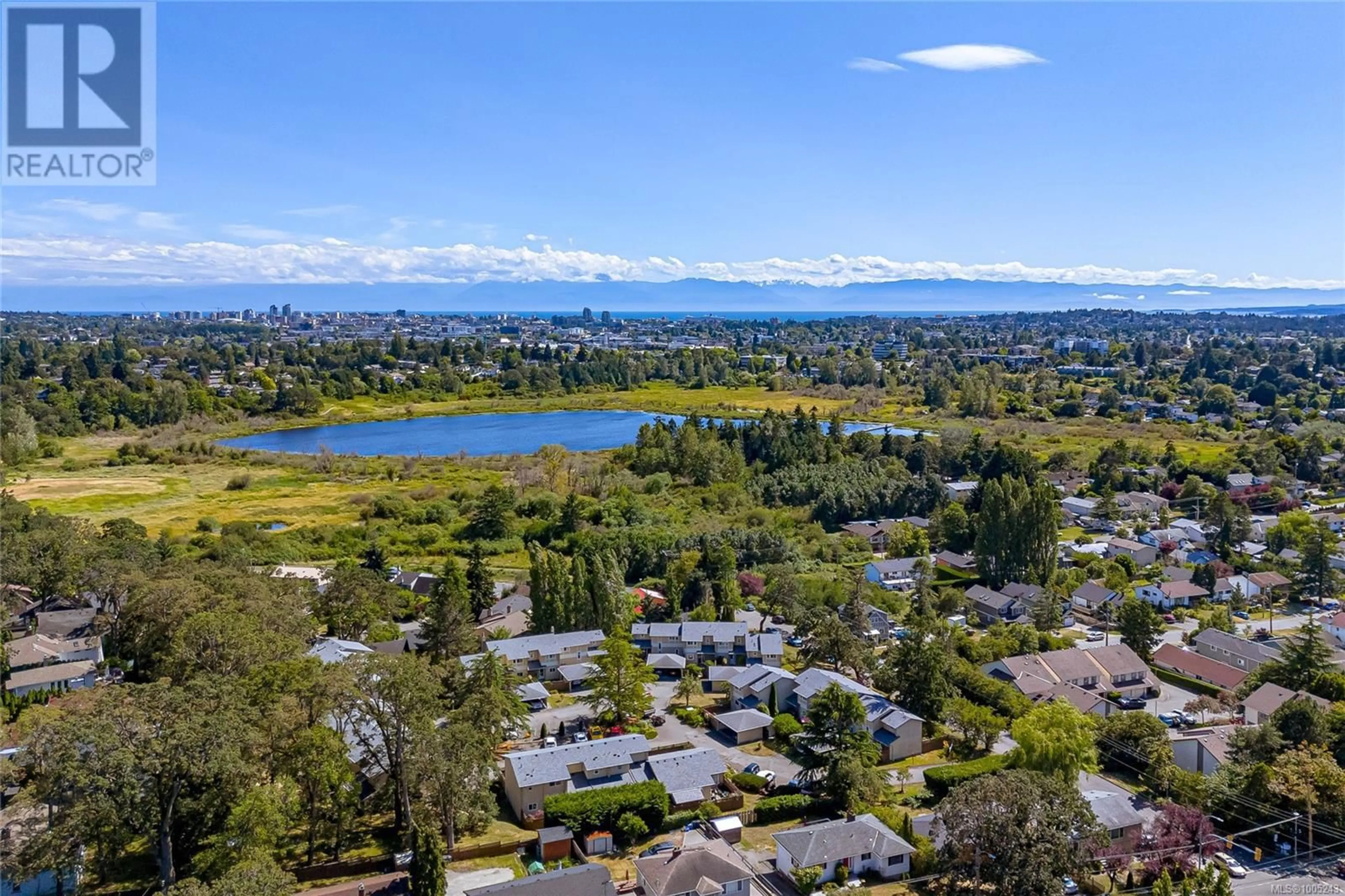 A pic from outside/outdoor area/front of a property/back of a property/a pic from drone, water/lake/river/ocean view for 22 - 3981 NELTHORPE STREET, Saanich British Columbia V8X0Z2