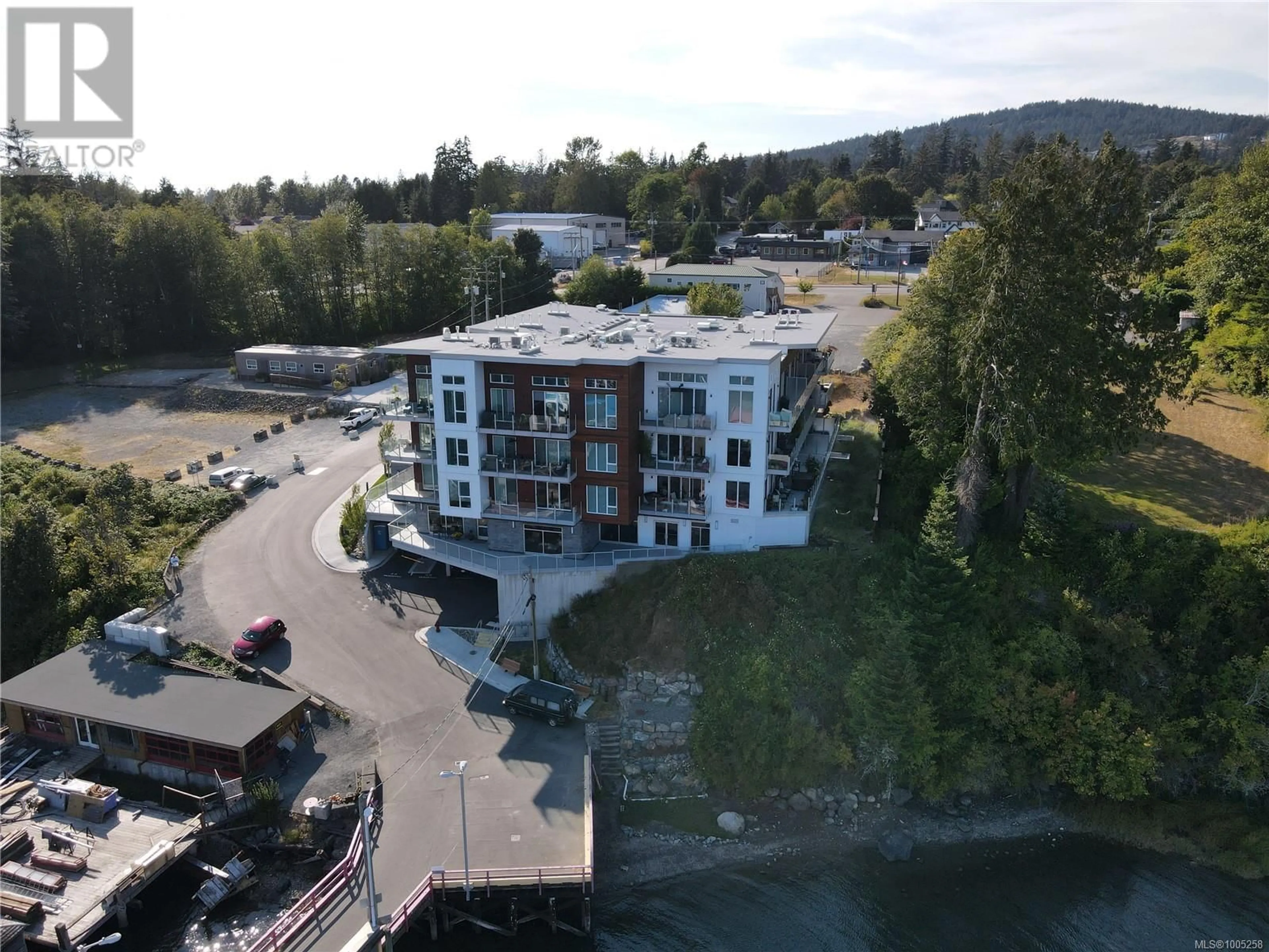 A pic from outside/outdoor area/front of a property/back of a property/a pic from drone, unknown for 305 - 1820 MAPLE AVENUE SOUTH, Sooke British Columbia V9Z0N9
