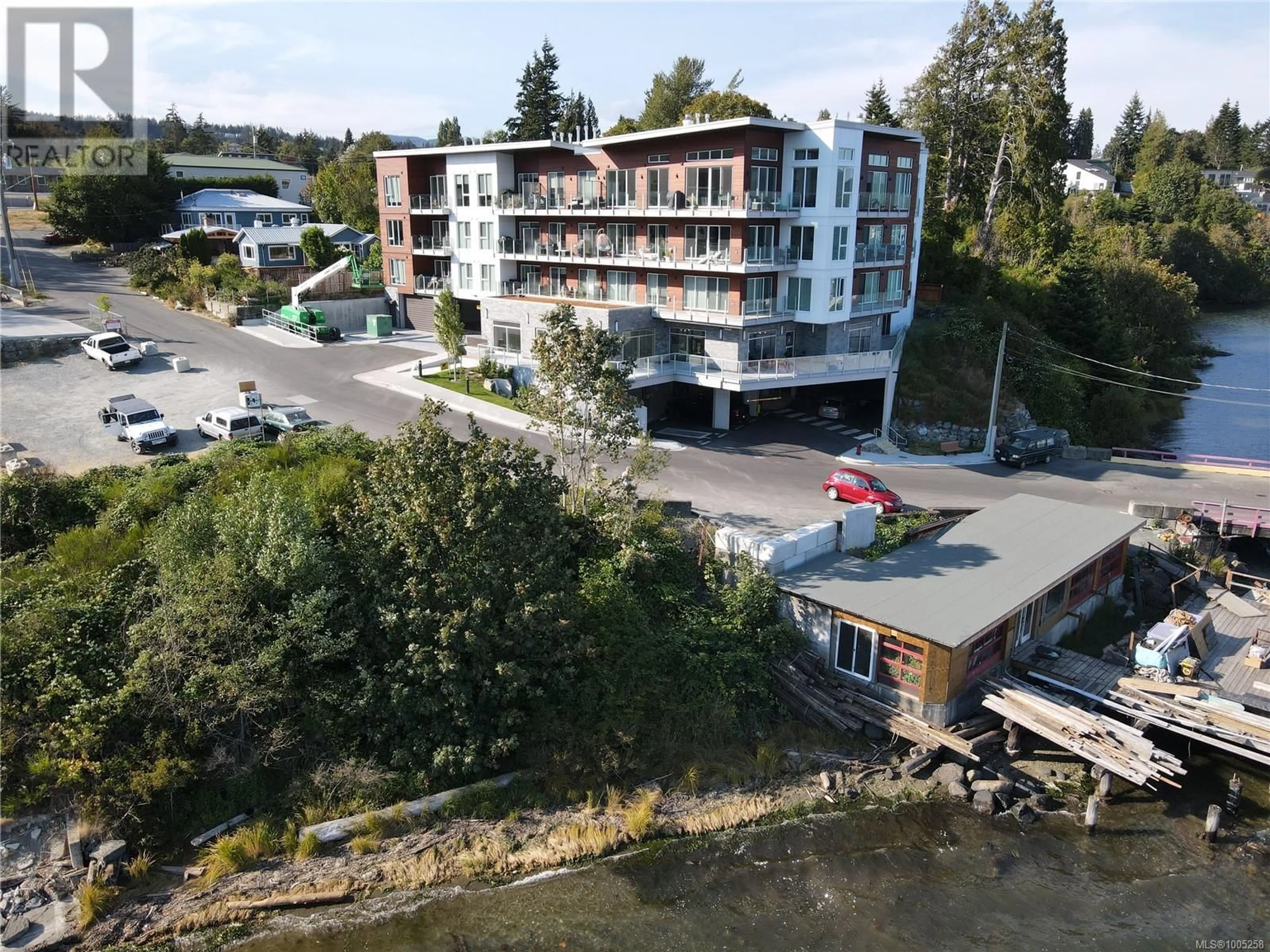 A pic from outside/outdoor area/front of a property/back of a property/a pic from drone, building for 305 - 1820 MAPLE AVENUE SOUTH, Sooke British Columbia V9Z0N9