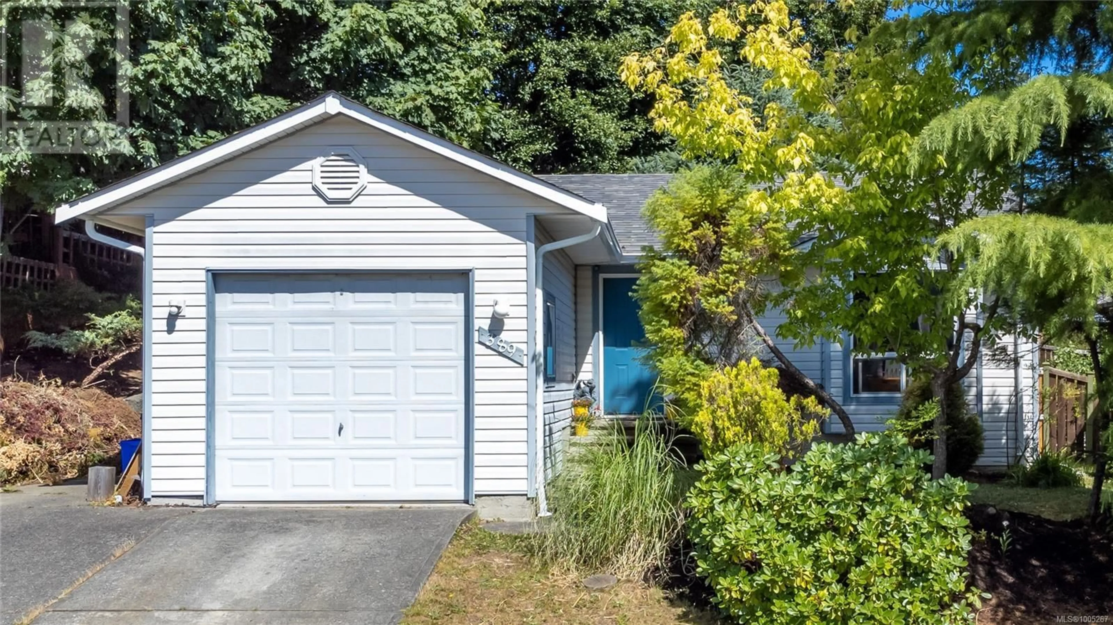 Home with vinyl exterior material, street for 389 CANDY LANE, Campbell River British Columbia V9W7Y8