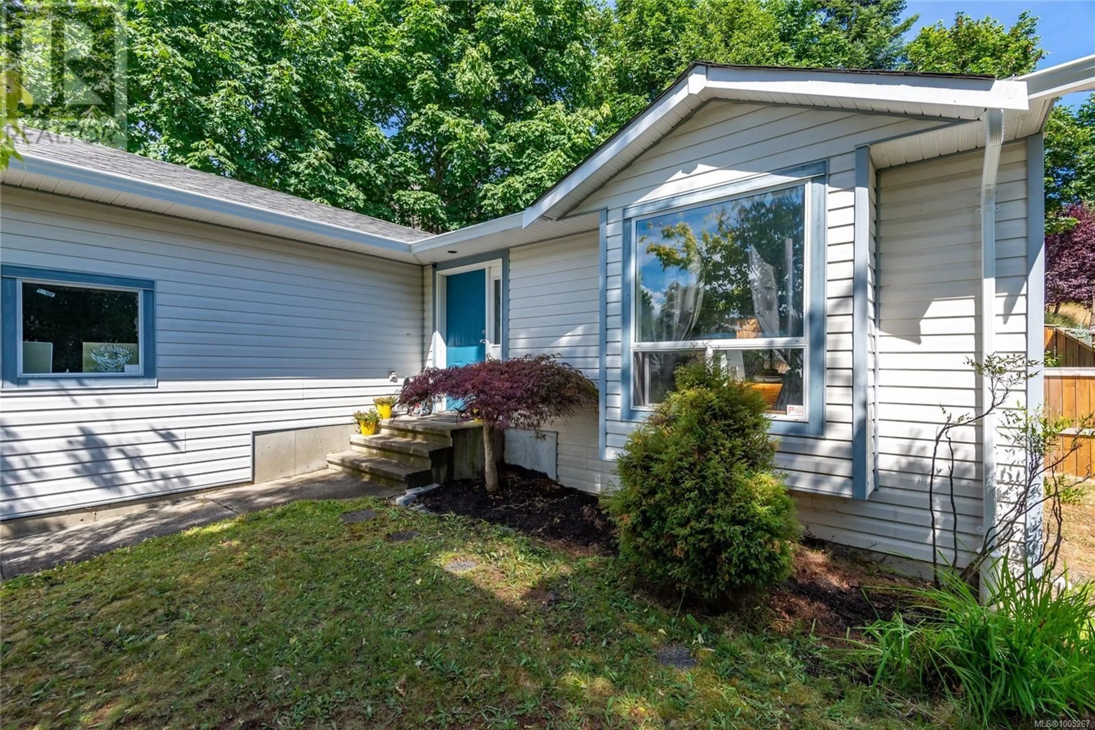 Home with vinyl exterior material, unknown for 389 CANDY LANE, Campbell River British Columbia V9W7Y8