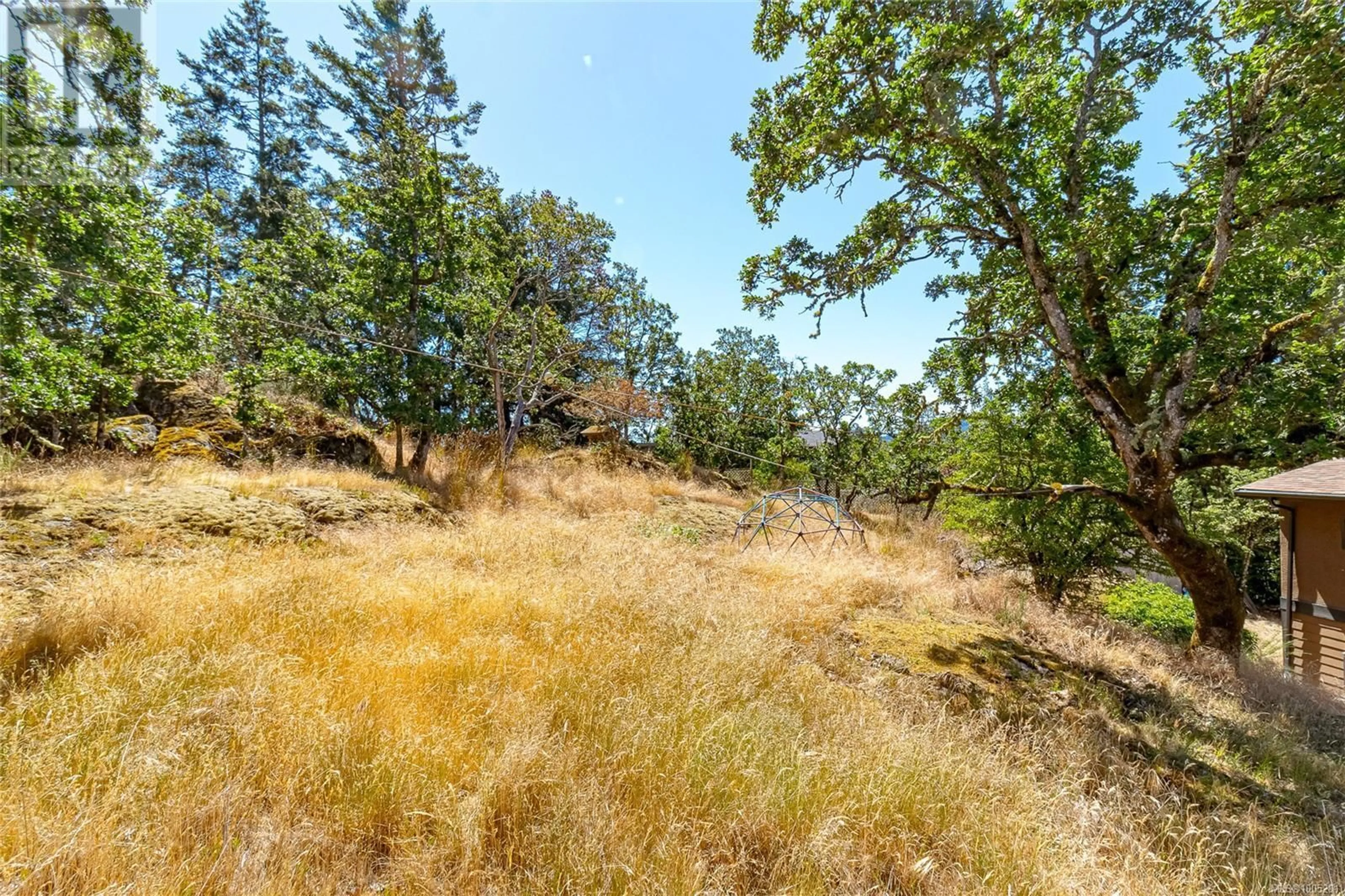 A pic from outside/outdoor area/front of a property/back of a property/a pic from drone, forest/trees view for 2673 FLORENCE LAKE ROAD, Langford British Columbia V9B4H5