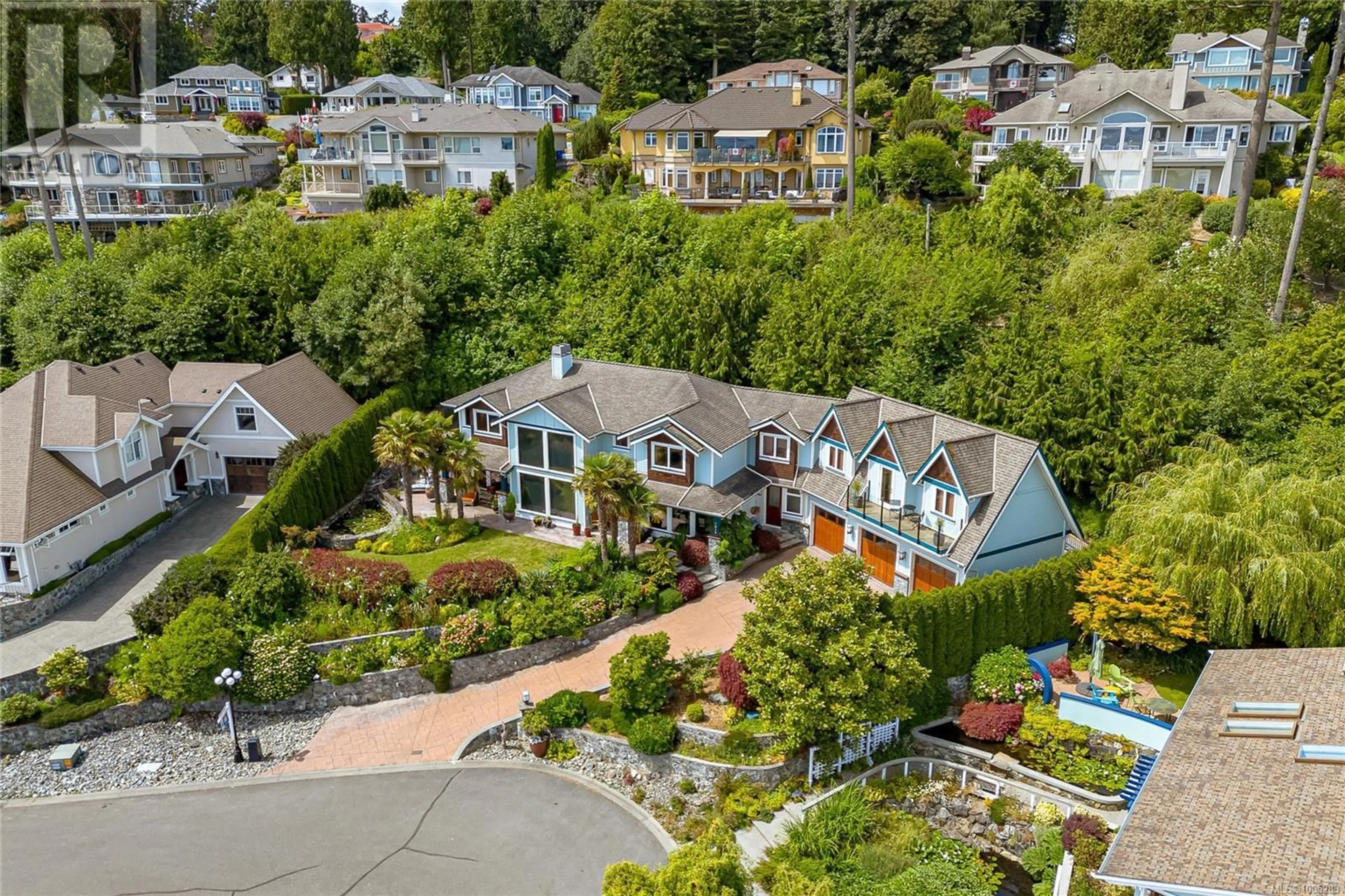 A pic from outside/outdoor area/front of a property/back of a property/a pic from drone, mountain view for 7014 BEACH VIEW COURT, Central Saanich British Columbia V8M2J7