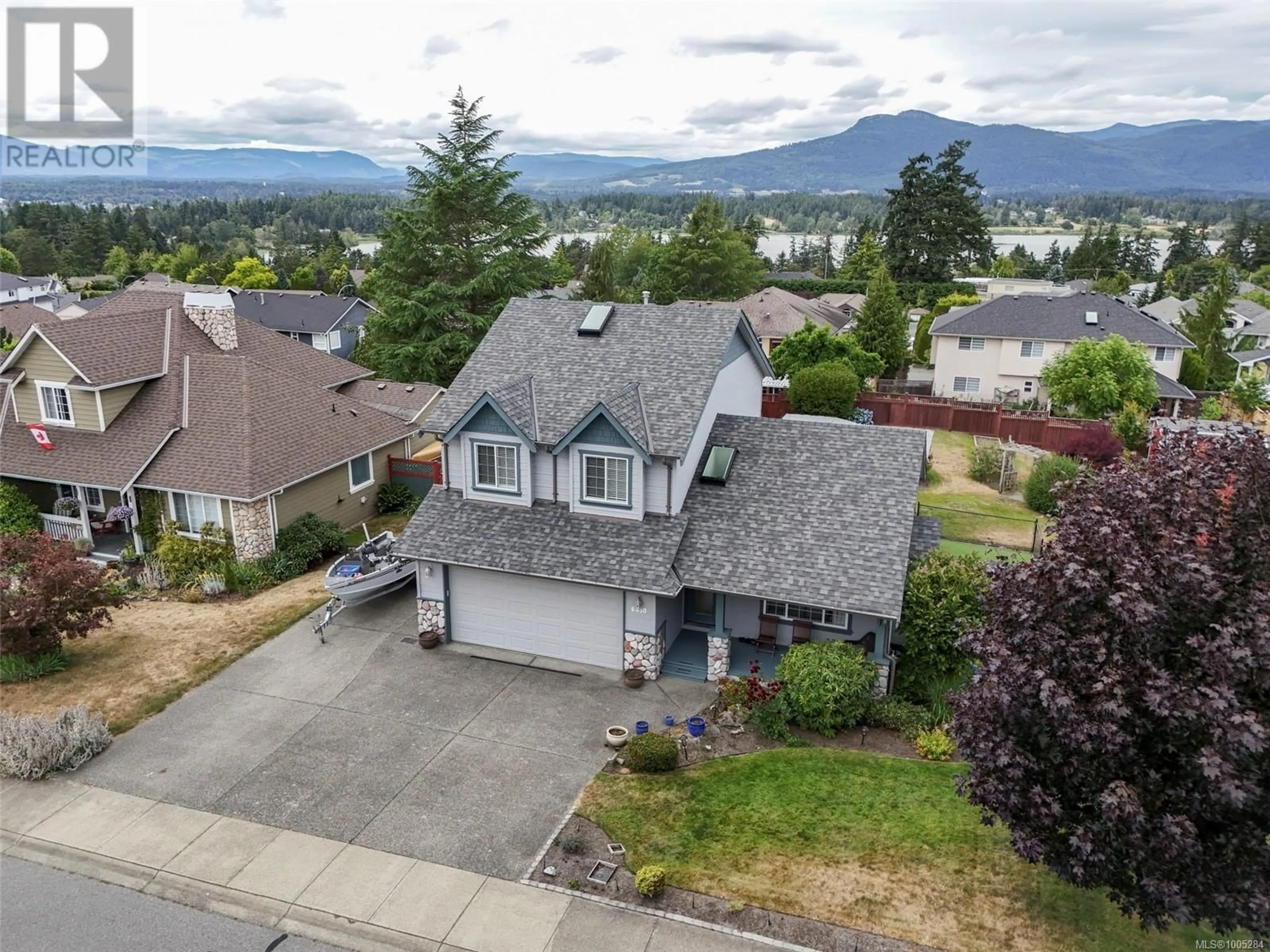 A pic from outside/outdoor area/front of a property/back of a property/a pic from drone, mountain view for 6050 EAGLE RIDGE TERRACE, Duncan British Columbia V9L6R1