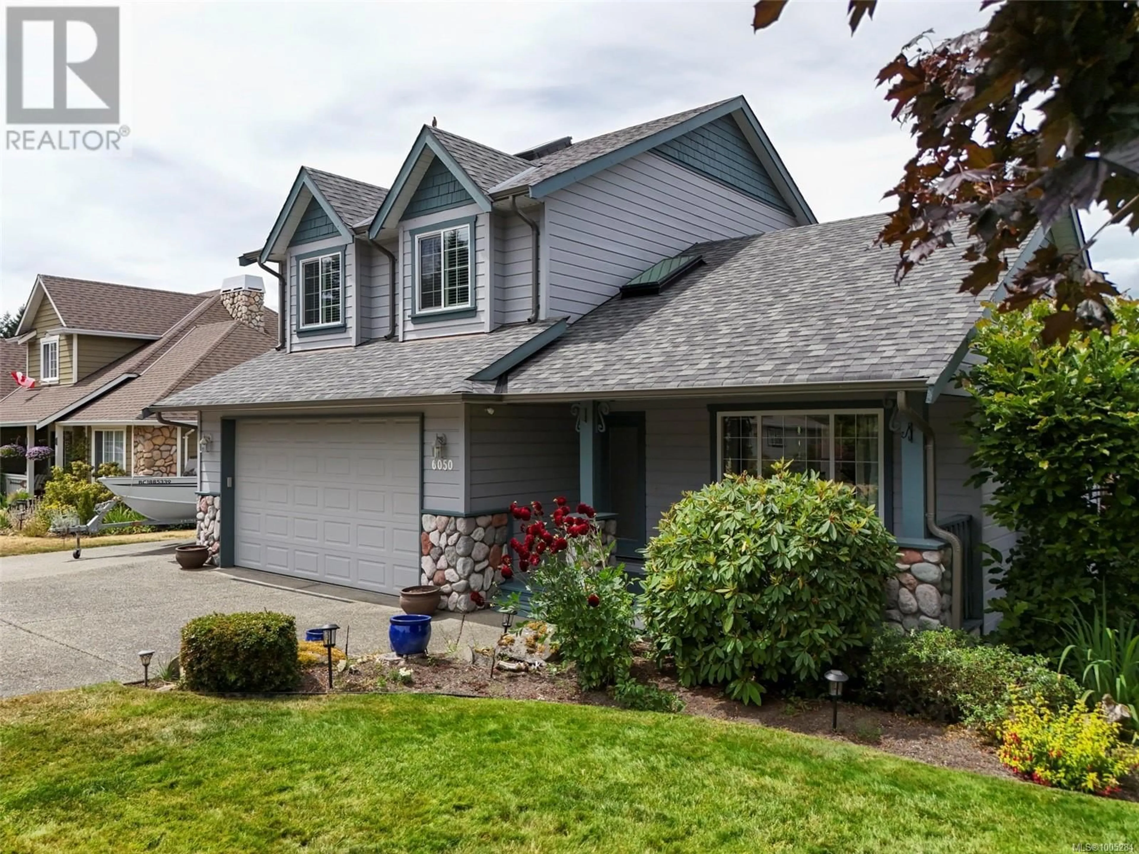 Home with vinyl exterior material, street for 6050 EAGLE RIDGE TERRACE, Duncan British Columbia V9L6R1