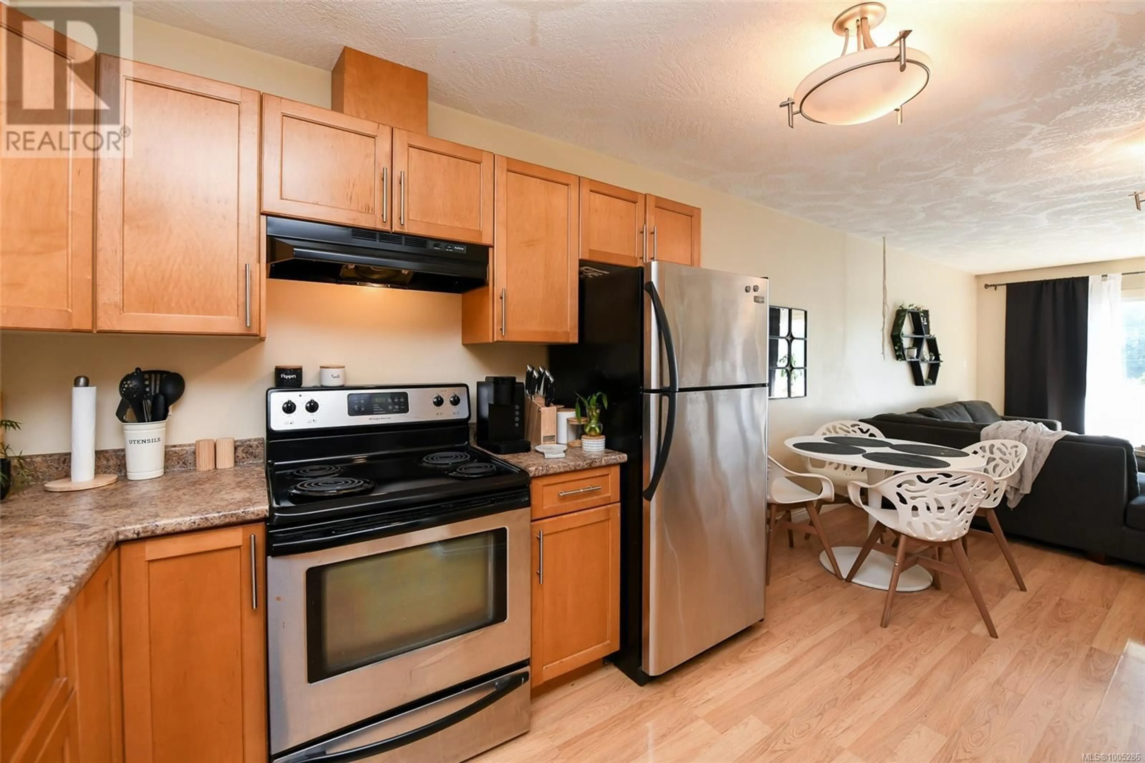Standard kitchen, wood/laminate floor for 305 - 840 SHAMROCK PLACE, Comox British Columbia V9M4G4