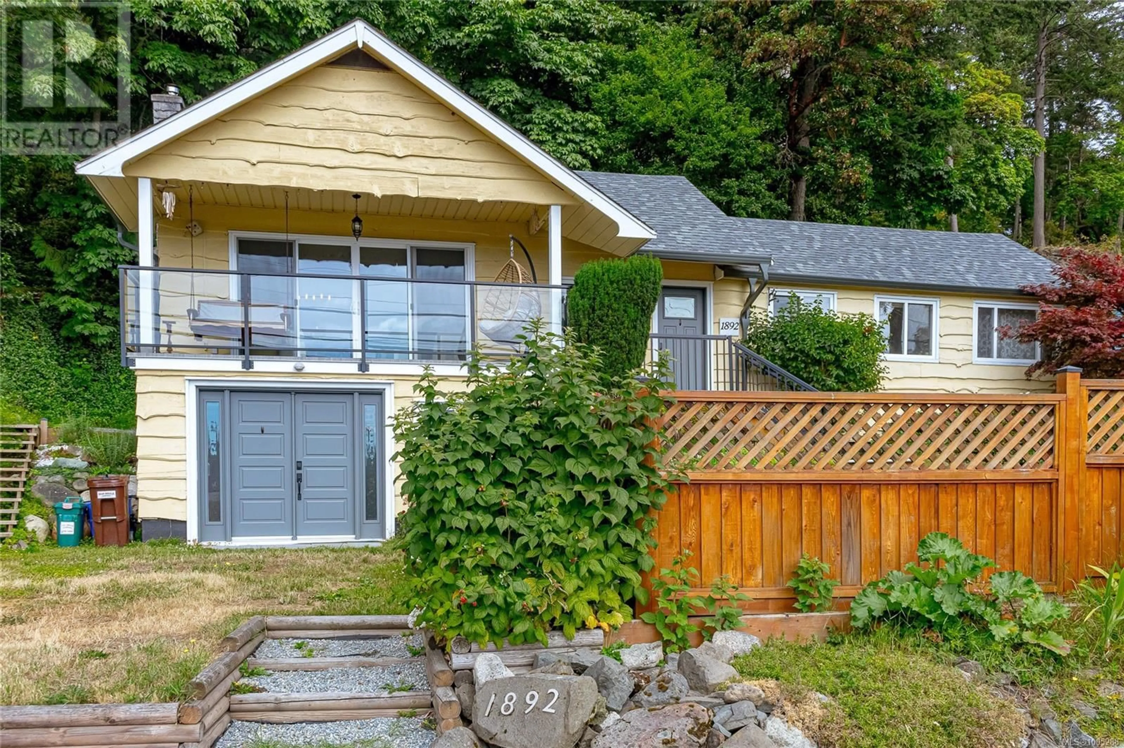 Home with vinyl exterior material, street for 1892 SWARTZ BAY ROAD, North Saanich British Columbia V8L5R2