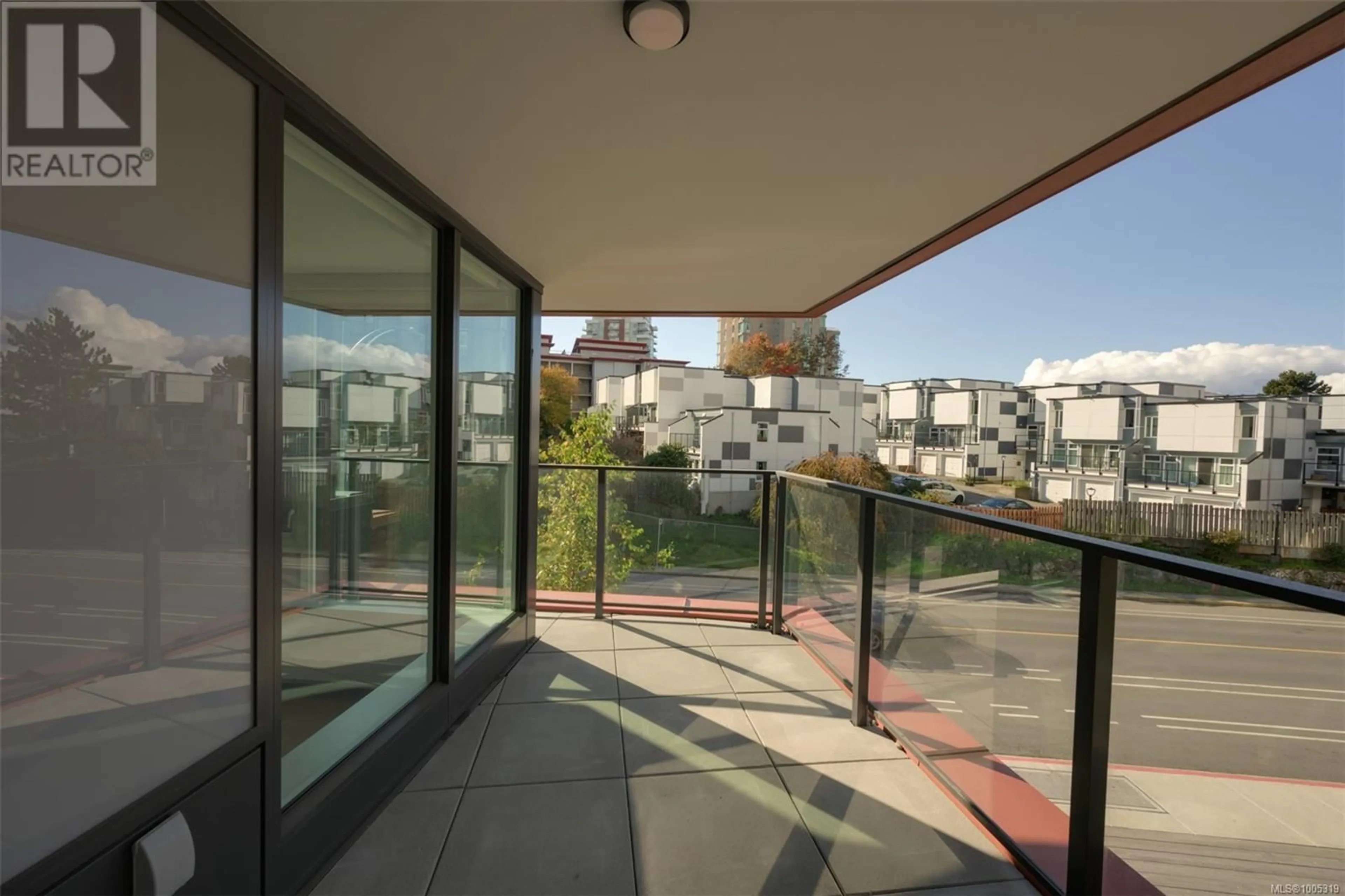 Balcony in the apartment, city buildings view from balcony for 305 - 363 TYEE ROAD, Victoria British Columbia V9A0B5