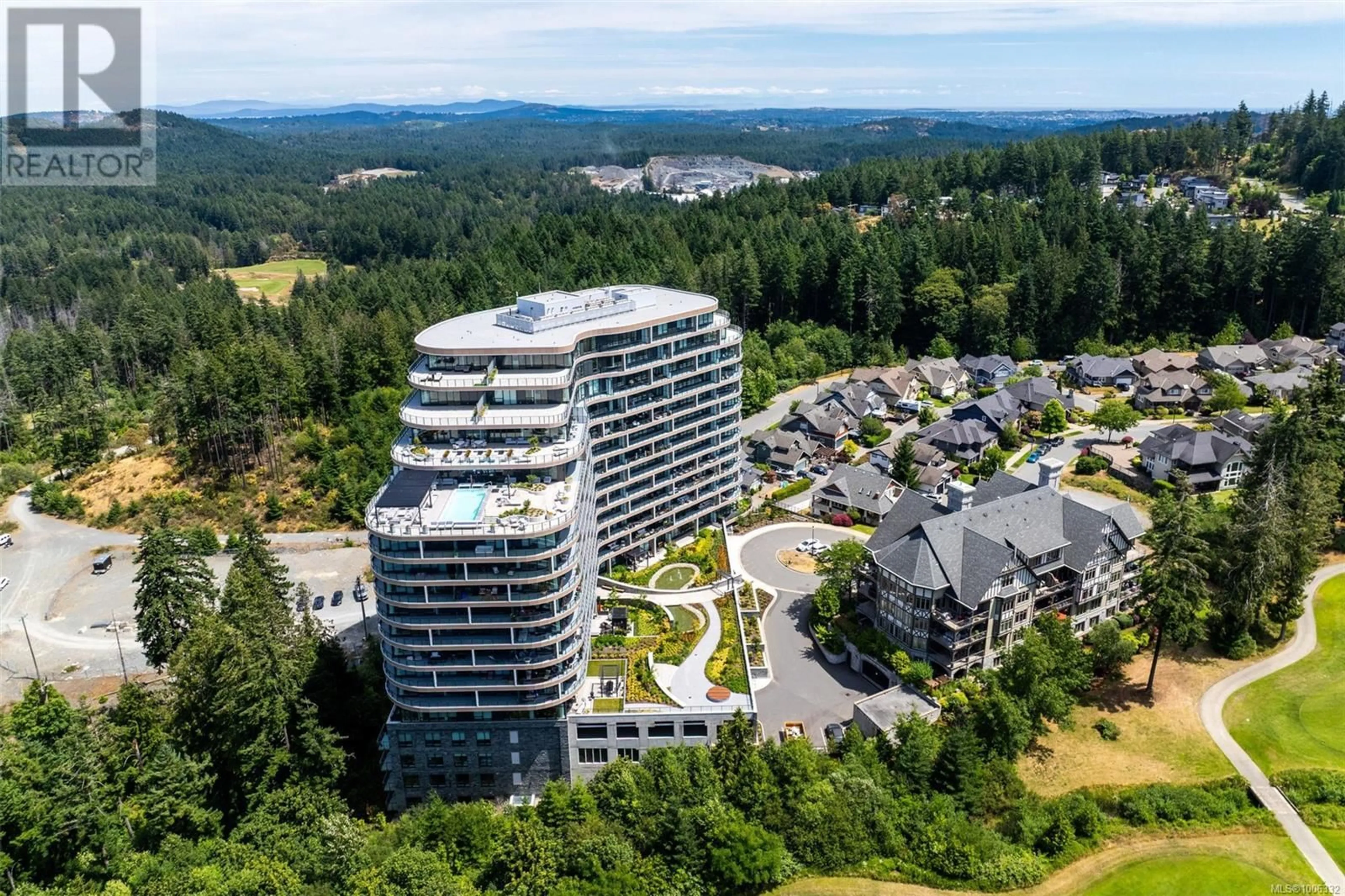 A pic from outside/outdoor area/front of a property/back of a property/a pic from drone, unknown for 703 - 2000 HANNINGTON ROAD, Langford British Columbia V9B7C1