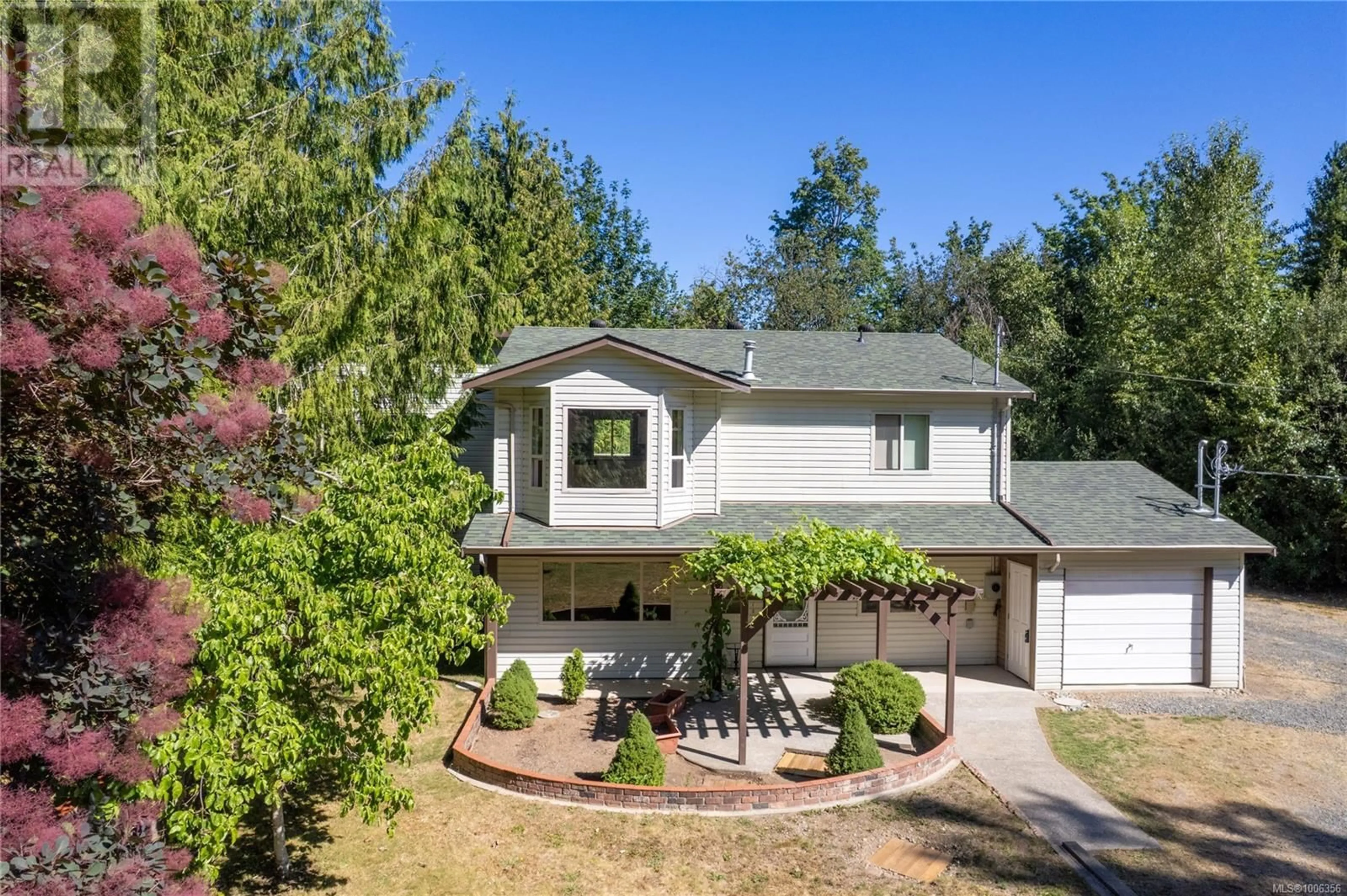 A pic from outside/outdoor area/front of a property/back of a property/a pic from drone, unknown for 1092 KOSKIMO ROAD, Qualicum Beach British Columbia V9K2R6