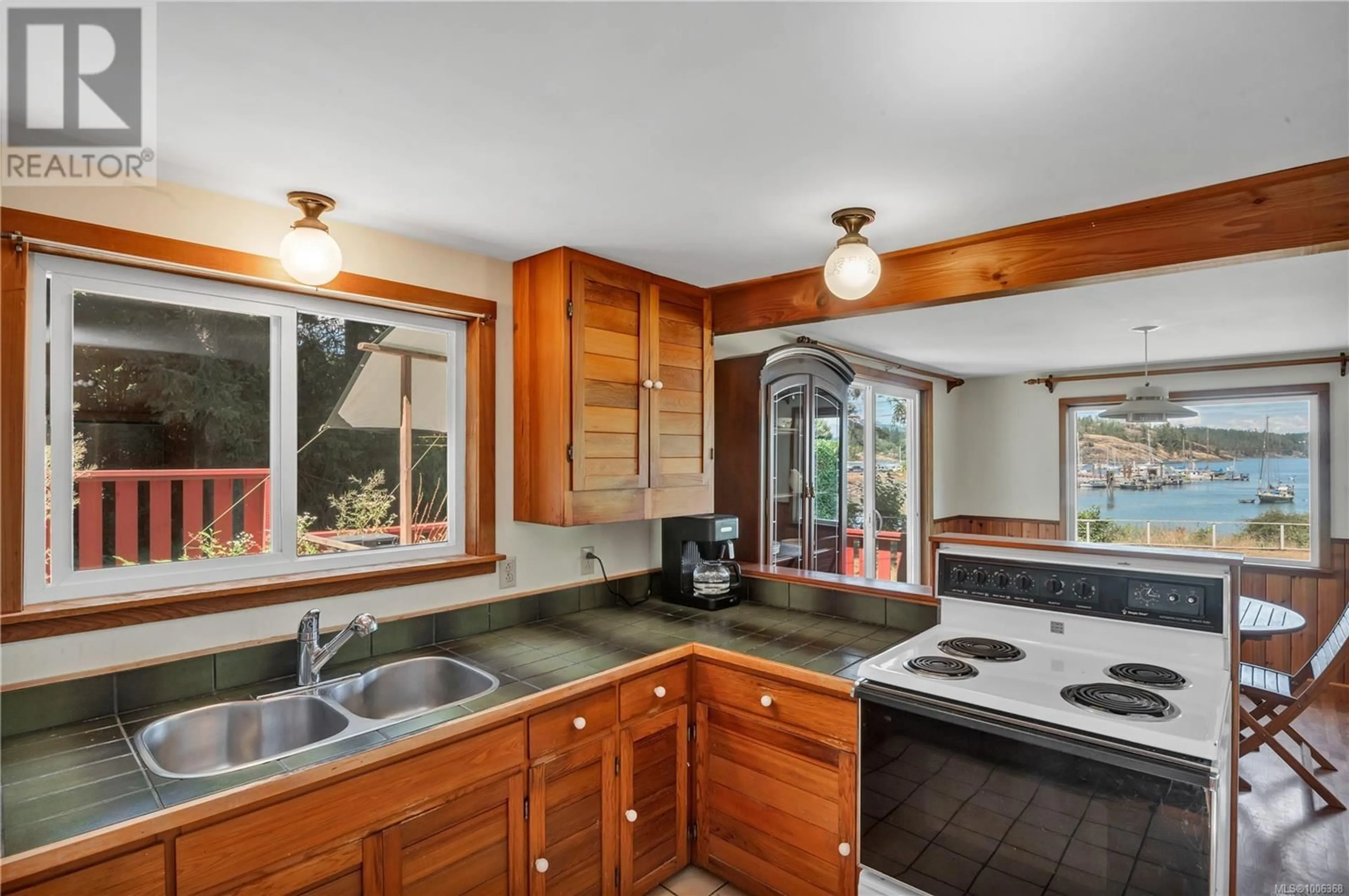 Standard kitchen, ceramic/tile floor for 681 BULL ROAD, Quadra Island British Columbia V0P1H0