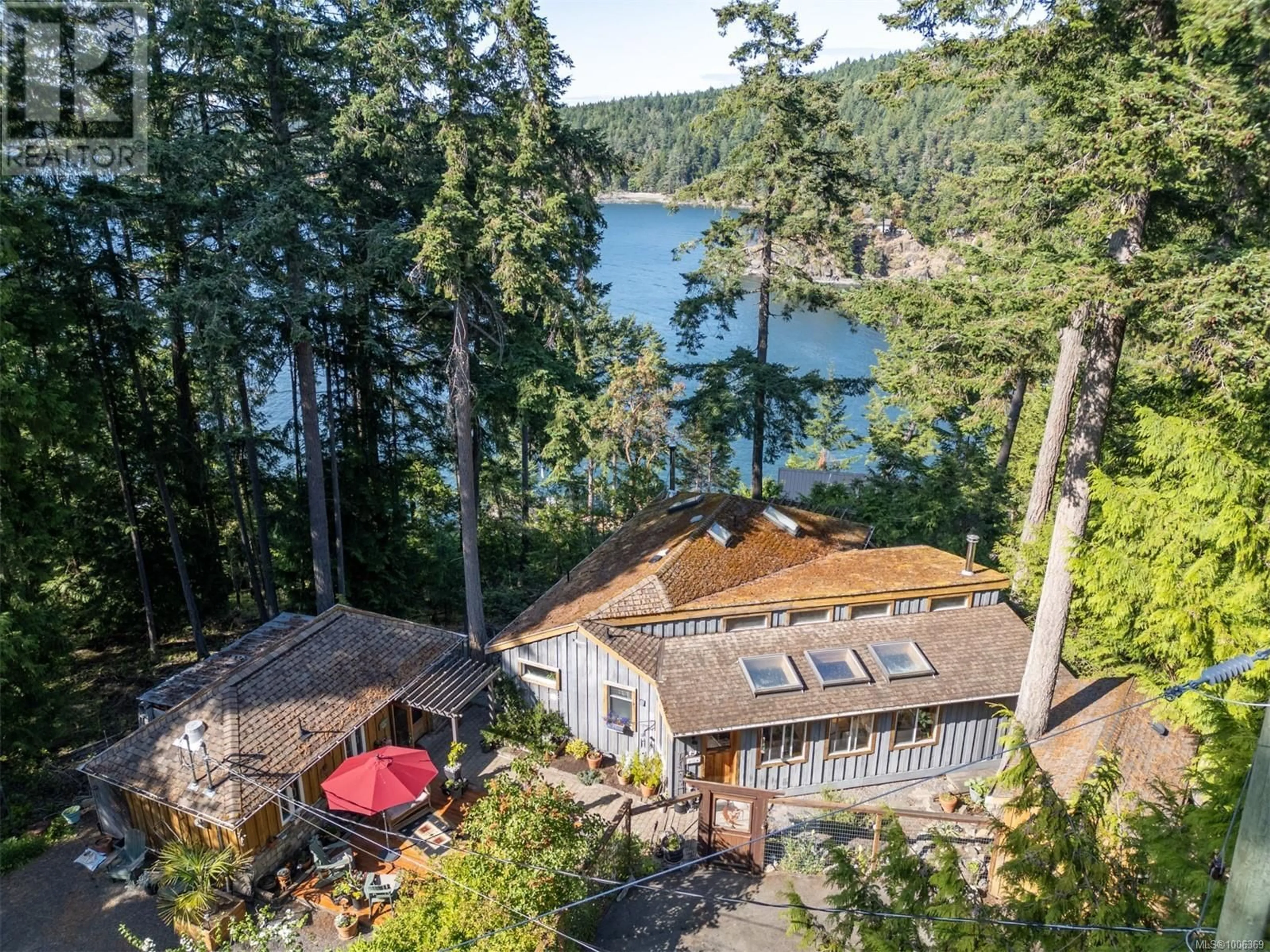 A pic from outside/outdoor area/front of a property/back of a property/a pic from drone, water/lake/river/ocean view for 1616 SCHOONER WAY, Pender Island British Columbia V0N2M2