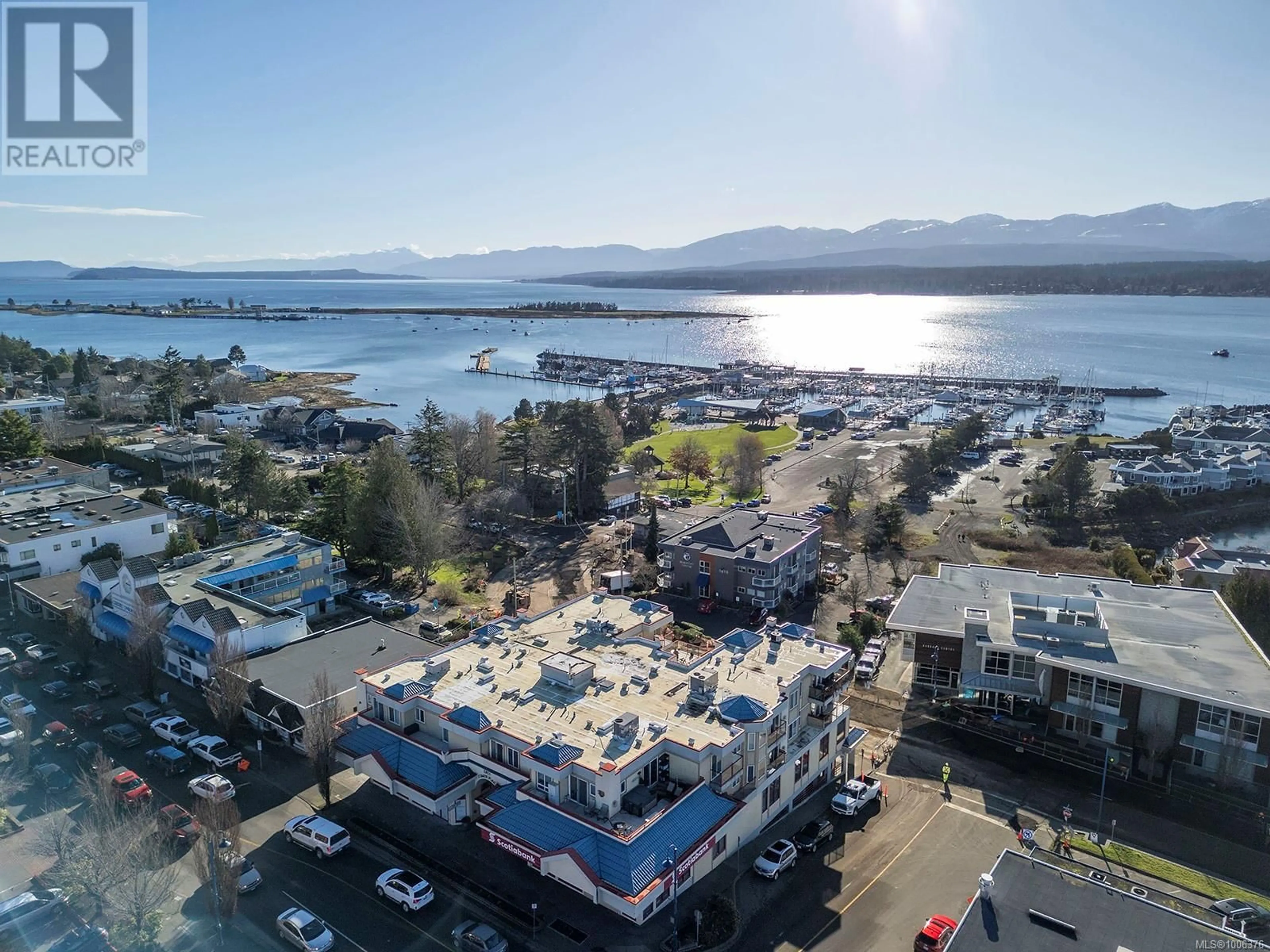 A pic from outside/outdoor area/front of a property/back of a property/a pic from drone, unknown for 303 - 1811 COMOX AVENUE, Comox British Columbia V9M3L9