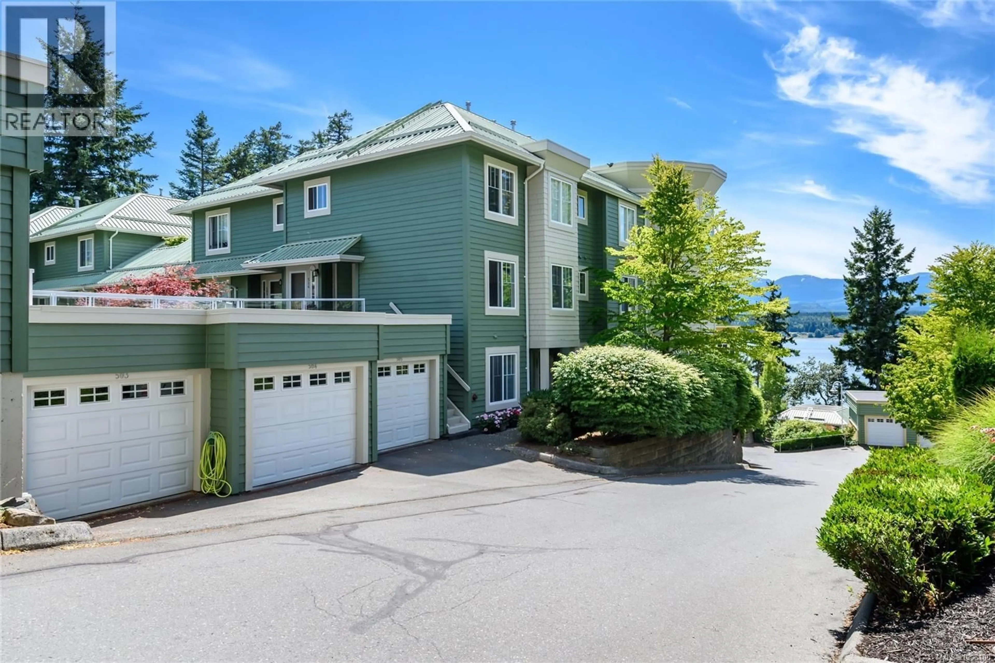 A pic from outside/outdoor area/front of a property/back of a property/a pic from drone, water/lake/river/ocean view for 504 - 2275 COMOX AVENUE, Comox British Columbia V9M1X6