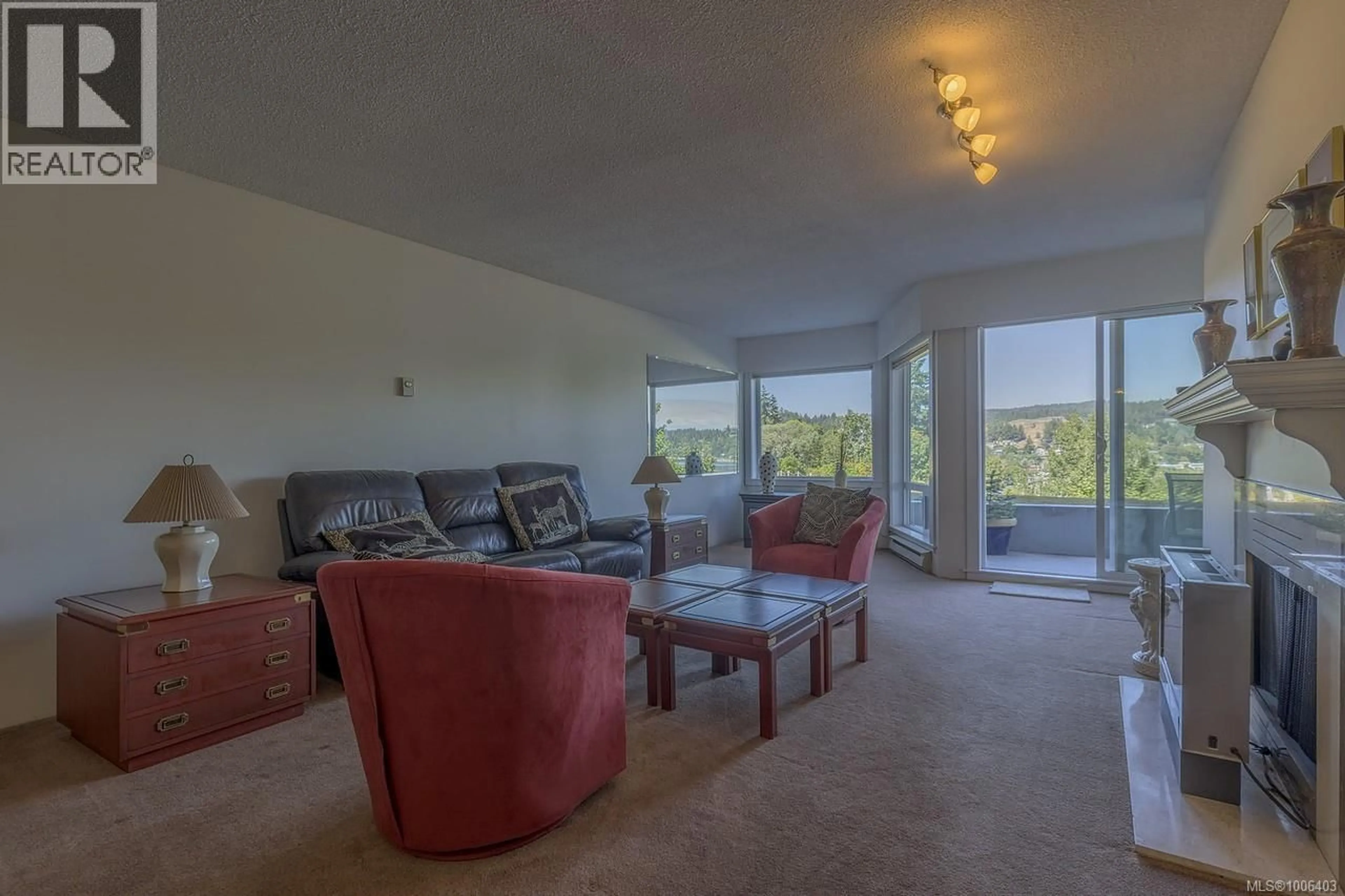 Living room with furniture, unknown for 104 - 2560 DEPARTURE BAY ROAD, Nanaimo British Columbia V9S5P1