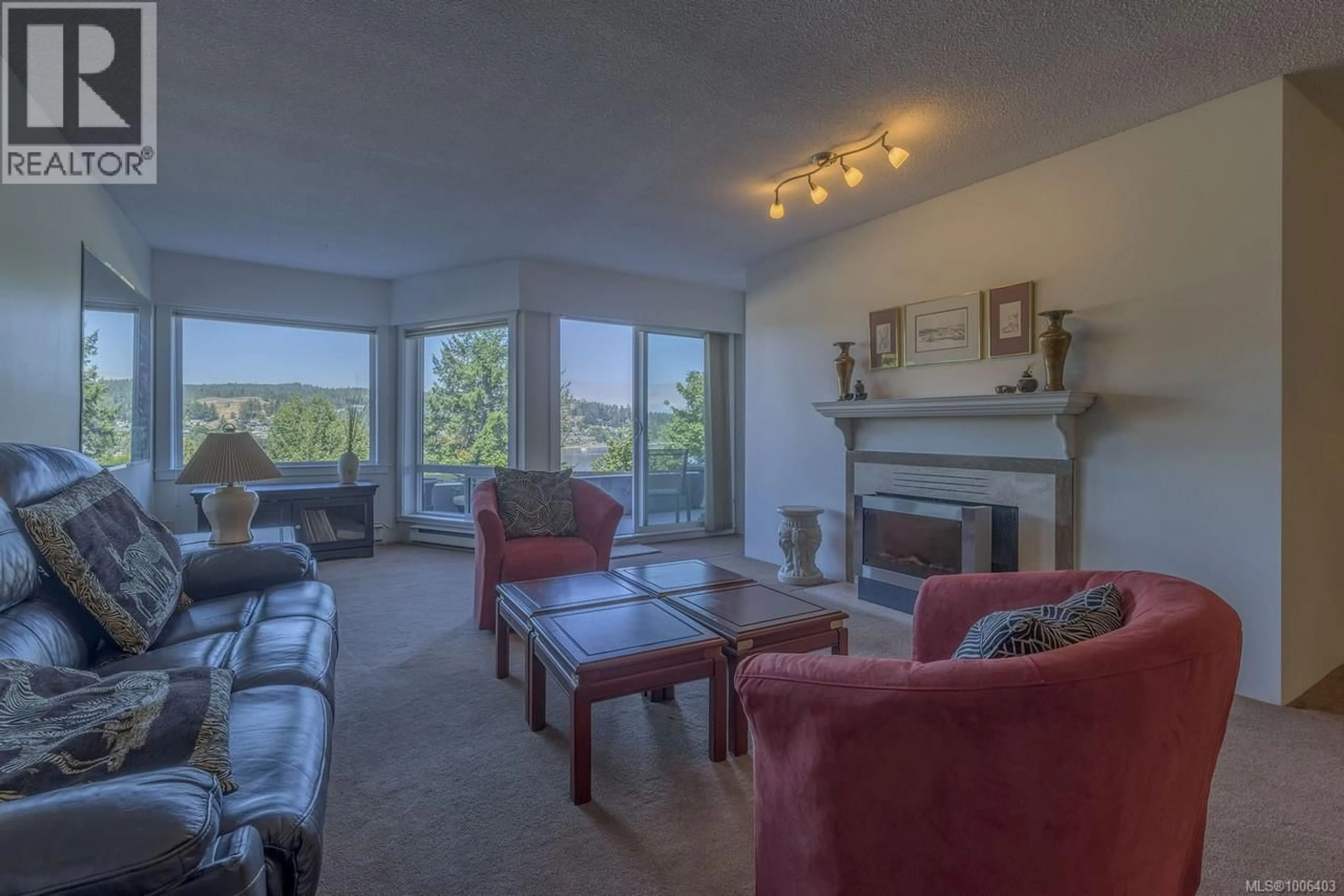 Living room with furniture, unknown for 104 - 2560 DEPARTURE BAY ROAD, Nanaimo British Columbia V9S5P1