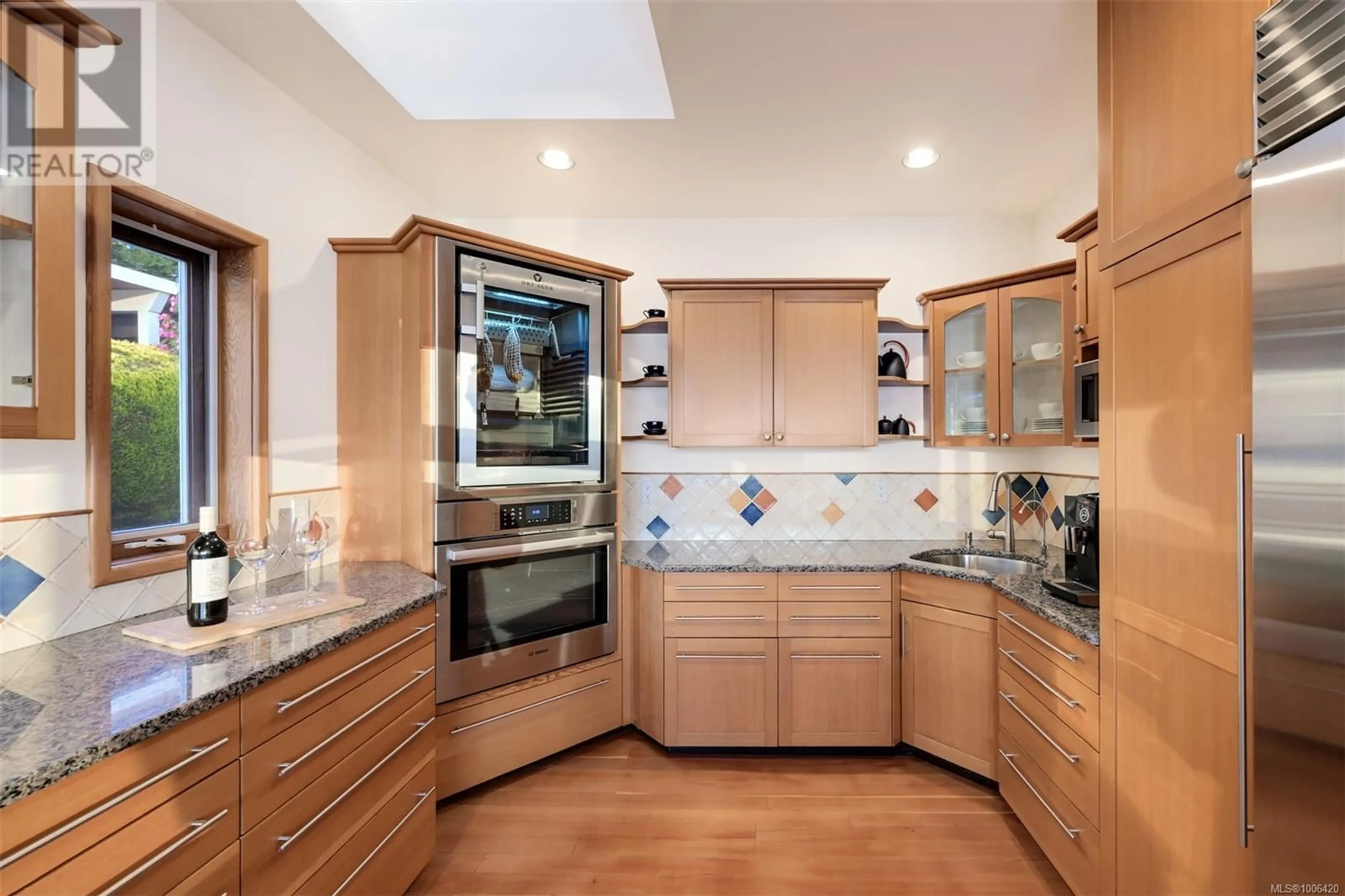 Contemporary kitchen, ceramic/tile floor for 4971 CORDOVA BAY ROAD, Saanich British Columbia V8Y2K1