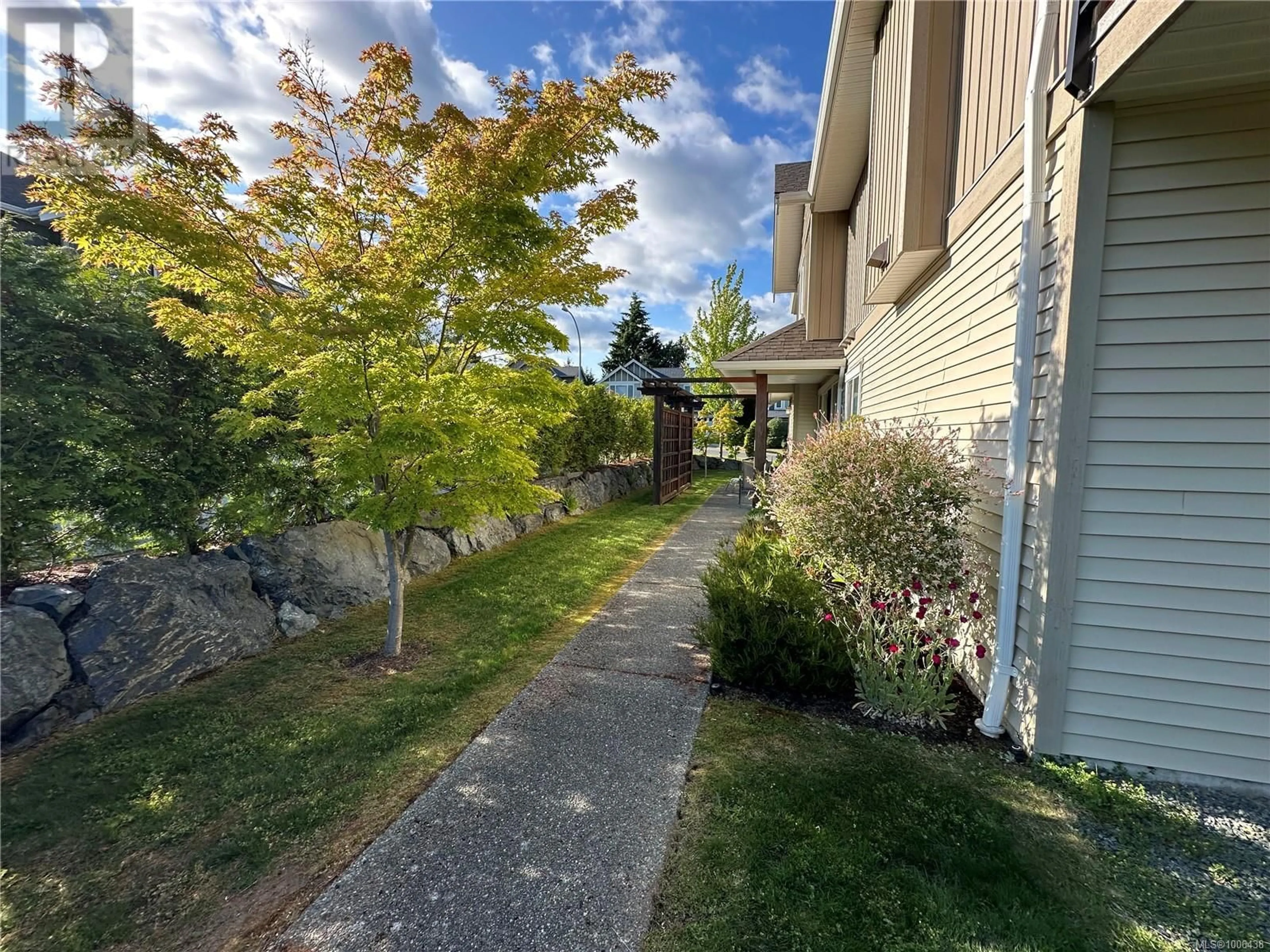 A pic from outside/outdoor area/front of a property/back of a property/a pic from drone, street for 4 - 6177 NITINAT WAY, Nanaimo British Columbia V9V0A9