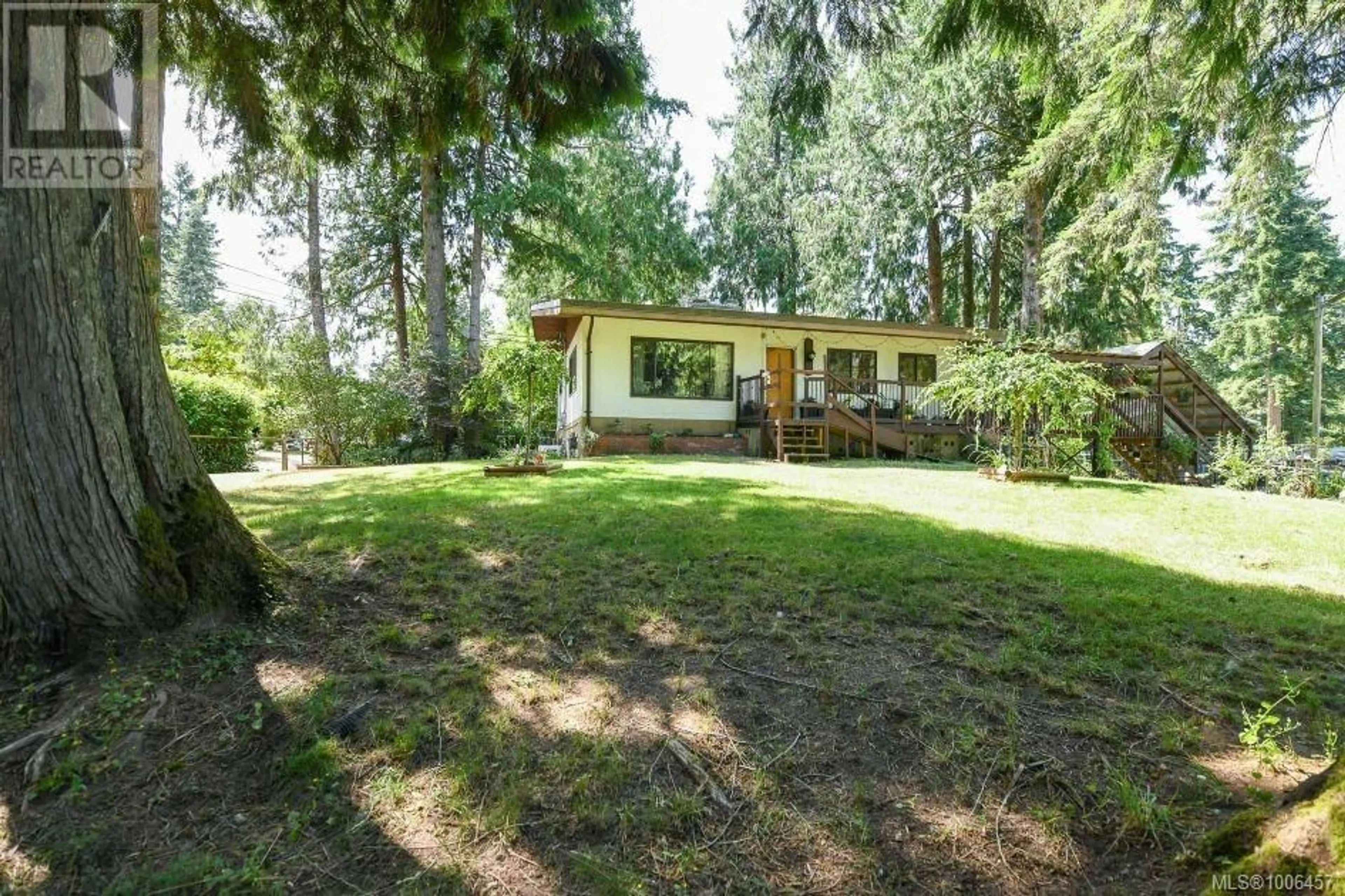 A pic from outside/outdoor area/front of a property/back of a property/a pic from drone, forest/trees view for 3822 ROYSTON ROAD, Courtenay British Columbia V0R2V0