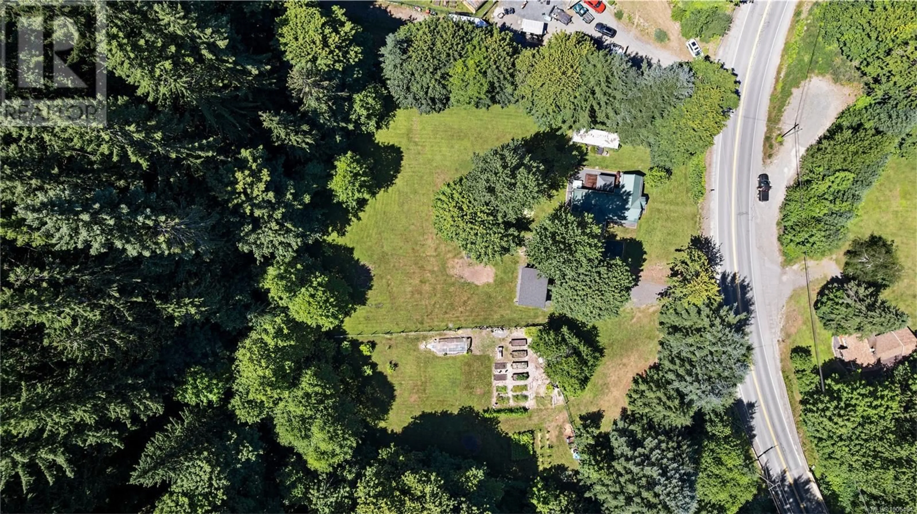 A pic from outside/outdoor area/front of a property/back of a property/a pic from drone, forest/trees view for 9490 SOUTH SHORE ROAD, Honeymoon Bay British Columbia V0R3E3