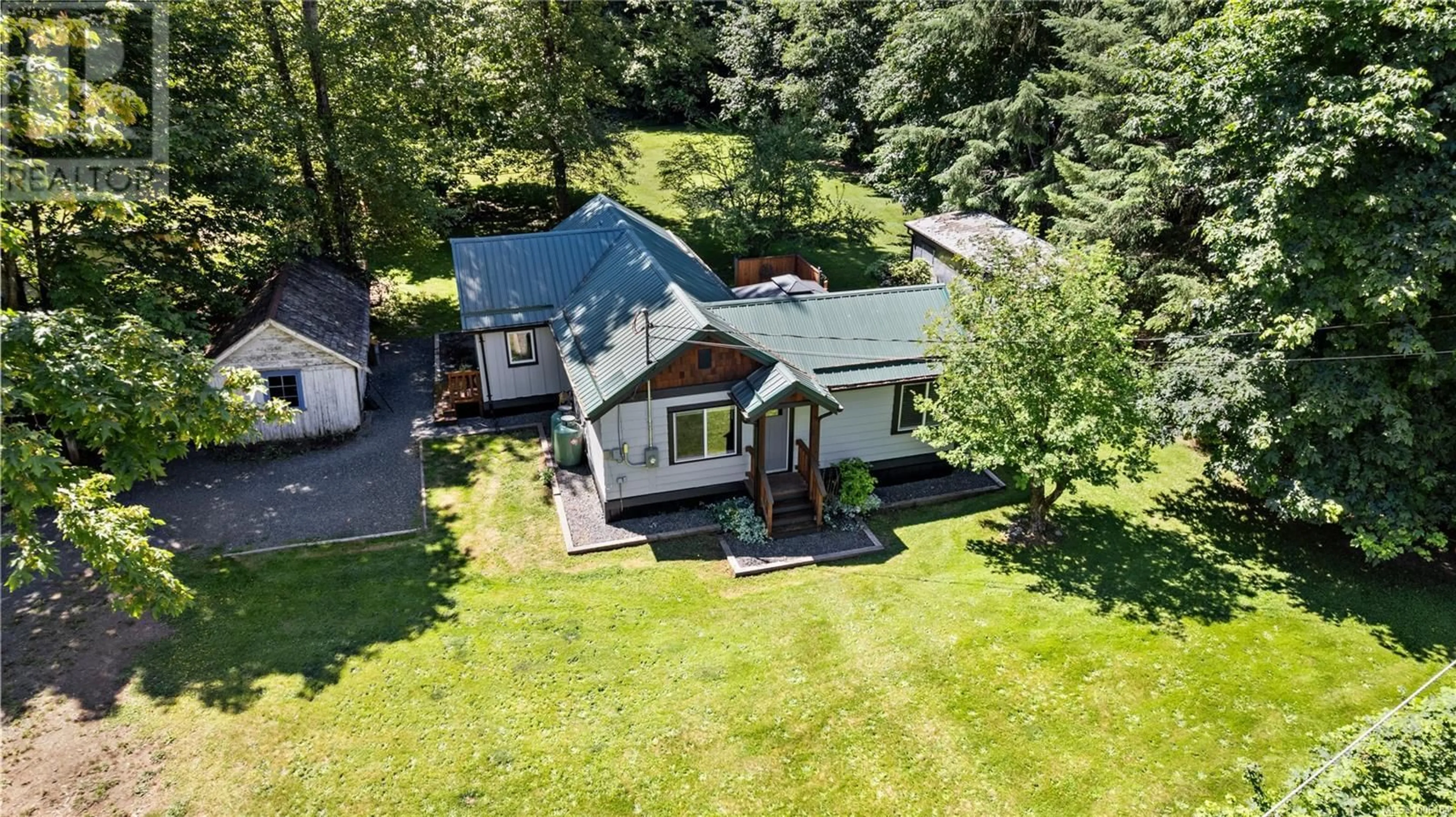 A pic from outside/outdoor area/front of a property/back of a property/a pic from drone, unknown for 9490 SOUTH SHORE ROAD, Honeymoon Bay British Columbia V0R3E3