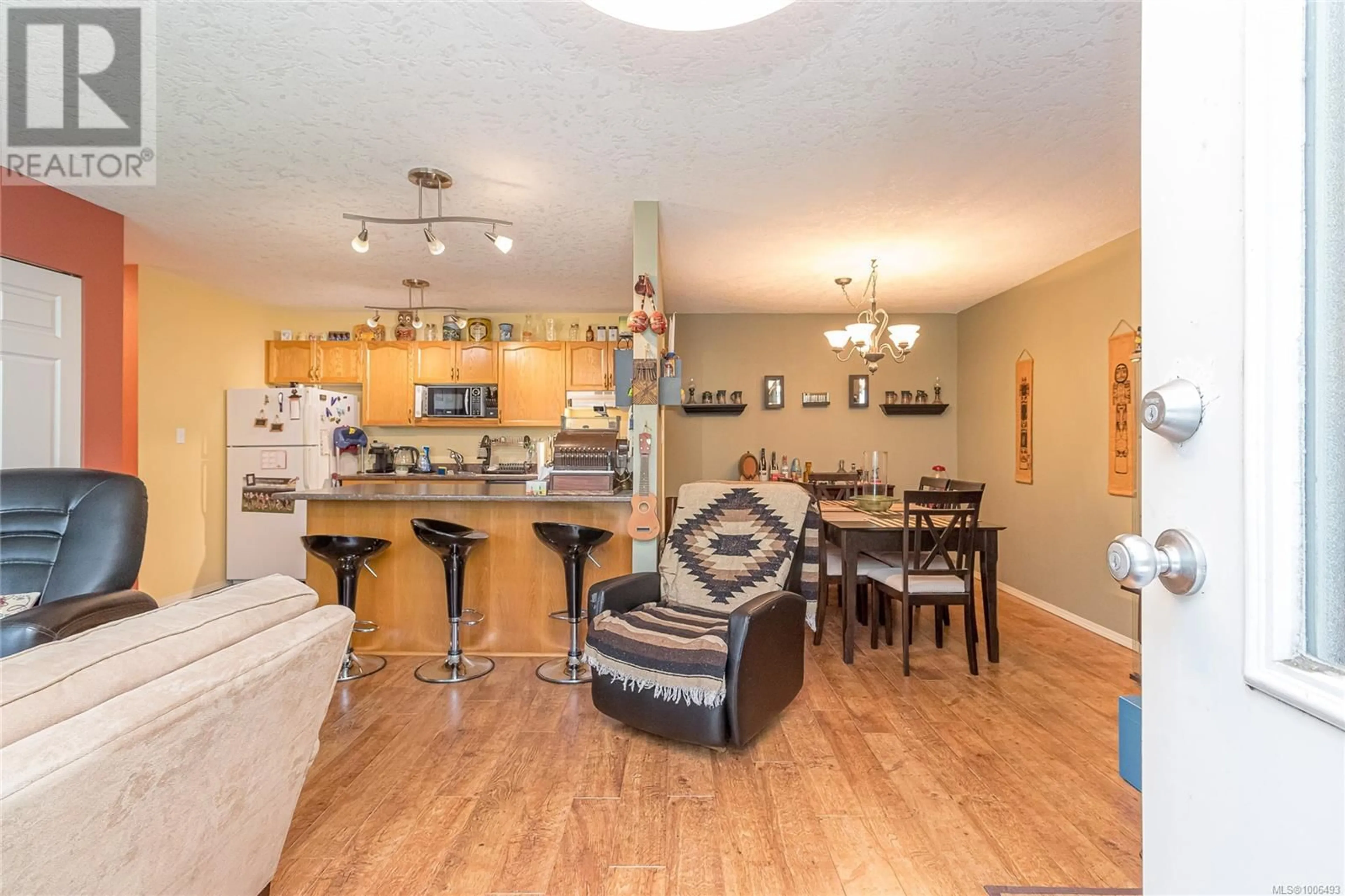 Open concept kitchen, wood/laminate floor for 108 - 2555 DINGWALL STREET, Duncan British Columbia V9L2Y8